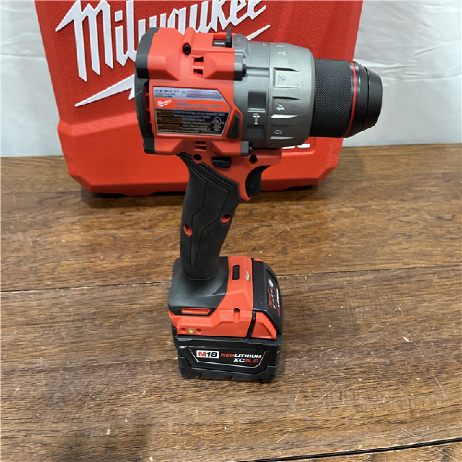 AS-ISMilwaukee 2904-22 Hammer Drill Driver Kit with Batteries  Charger & Tool Case  Red