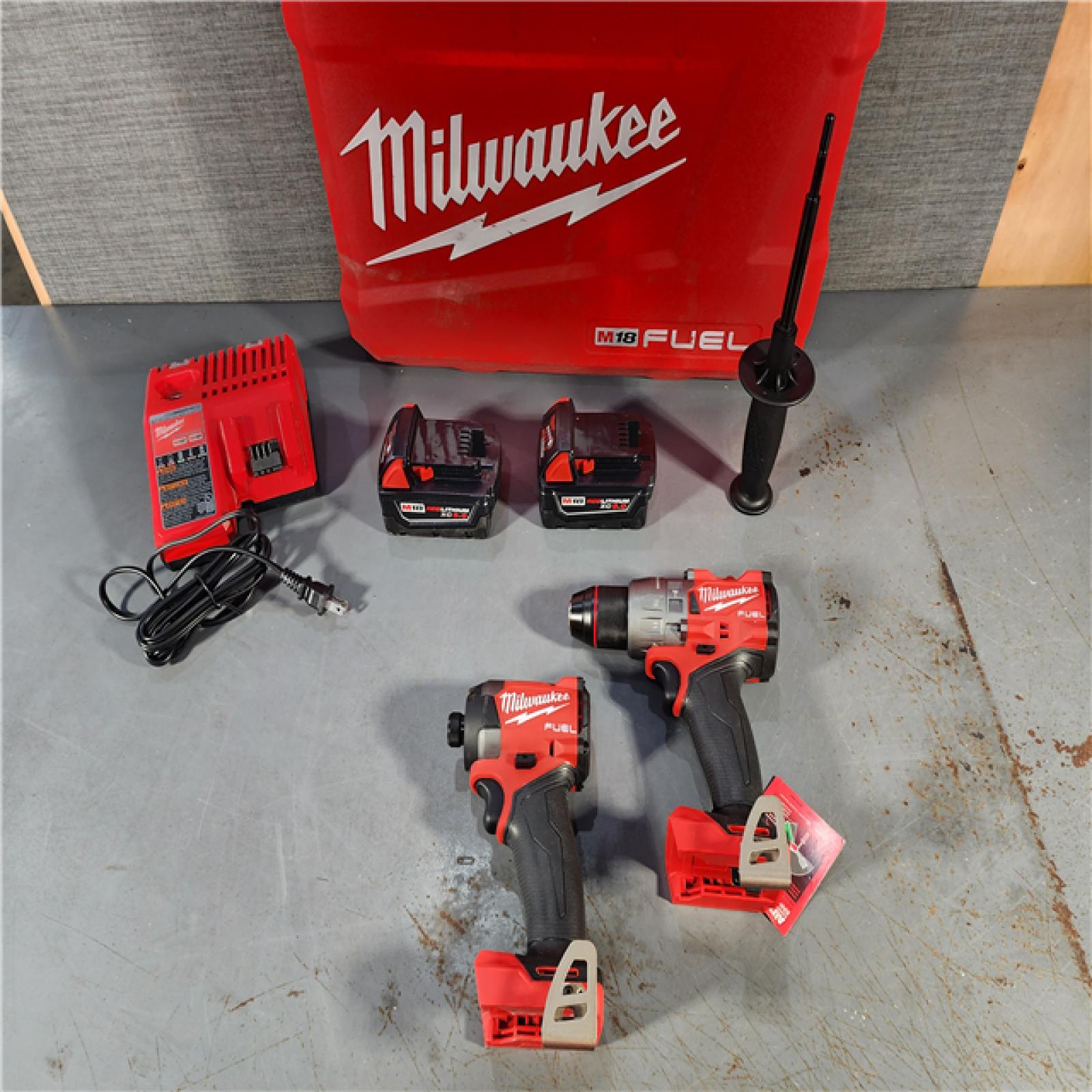 HOUSTON LOCATION - AS-IS (APPEARS LIKE NEW) Milwaukee M18 FUEL 18V Lithium-Ion Brushless Cordless Hammer Drill and Impact Driver Combo Kit (2-Tool) with 2 Batteries