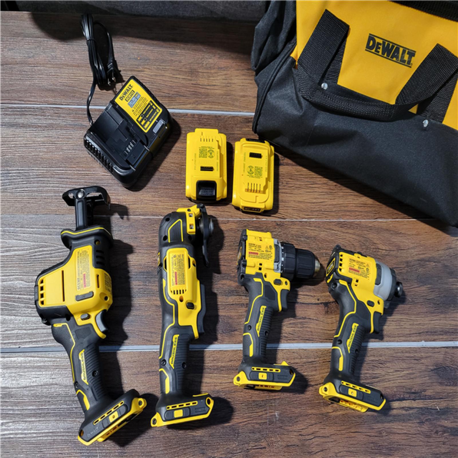 California As-Is Dewalt Brushless 4-Tool Combo Kit (Battery,Charger, and Tool Bag Included)