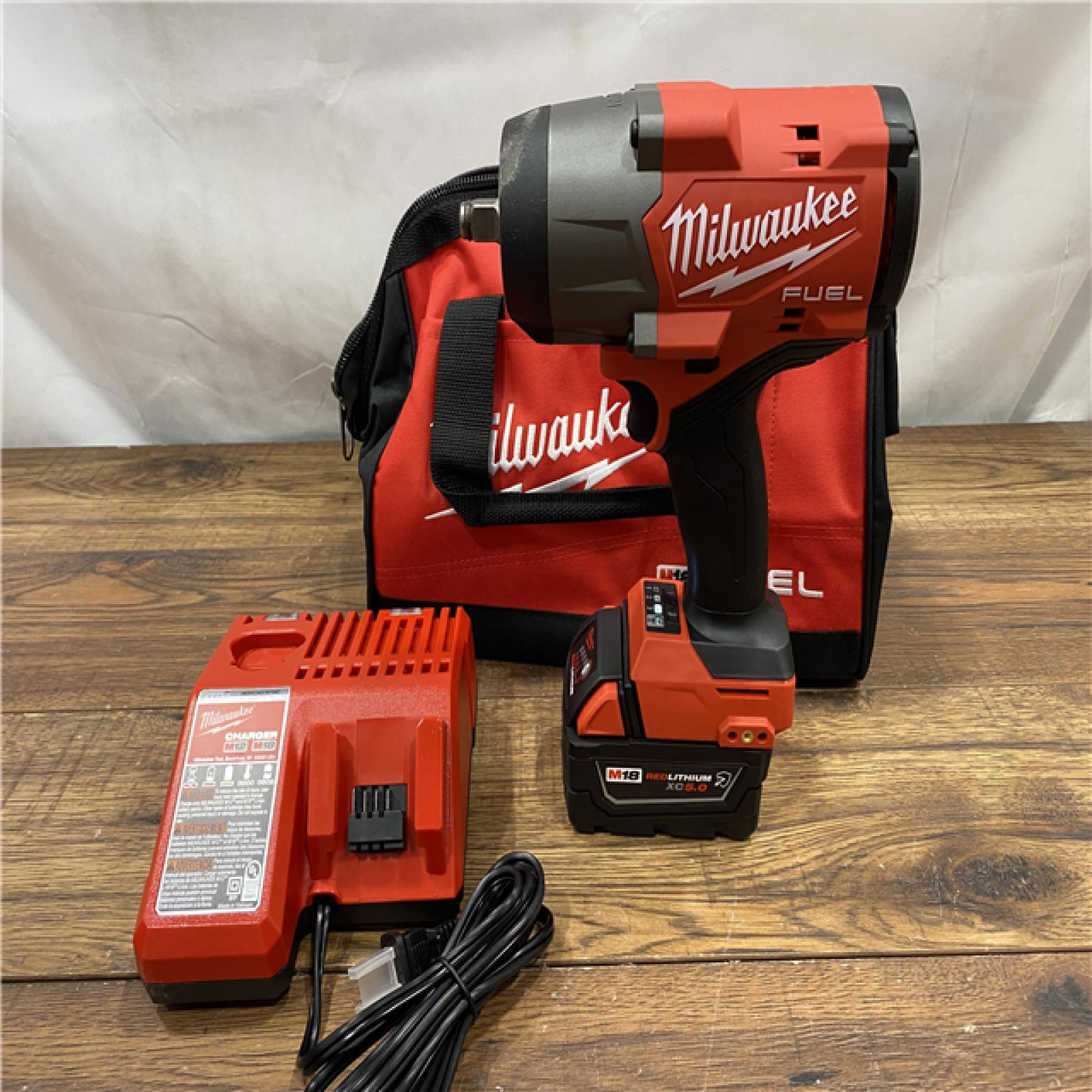 AS IS Milwaukee M18 1/2 in. Cordless Brushless High Torque Impact Wrench Kit (Battery & Charger)