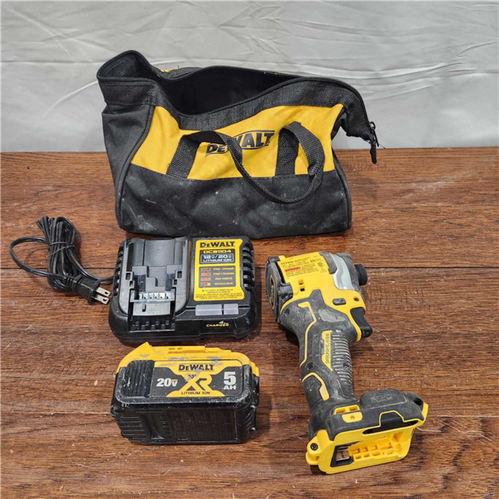 AS-IS ATOMIC 20V MAX Lithium-Ion Cordless 1/4 in. Brushless Impact Driver Kit, 5 Ah Battery, Charger, and Bag