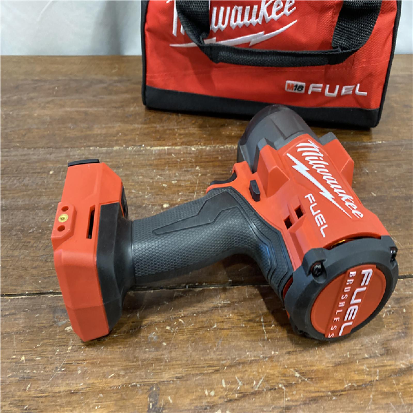 AS-ISMilwaukee M18 1/2 in. Cordless Brushless High Torque Impact Wrench Kit (Battery & Charger)