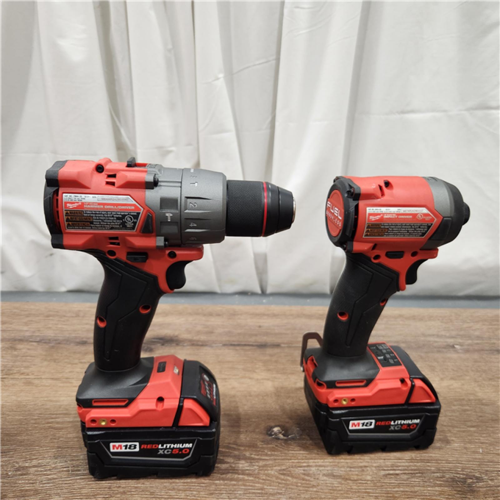 AS-IS Milwaukee M18 FUEL 18V Lithium-Ion Brushless Cordless Hammer Drill and Impact Driver Combo Kit (2-Tool) with 2 Batteries