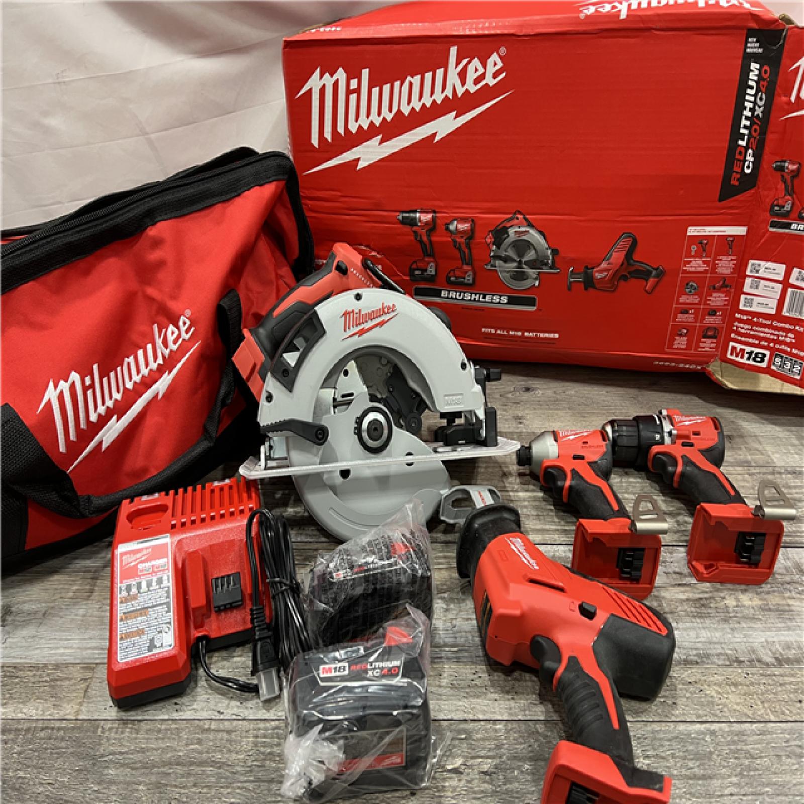 AS-IS Milwaukee M18 18-Volt Lithium-Ion Brushless Cordless Combo Kit (4-Tool) with 2-Batteries, 1-Charger and Tool Bag