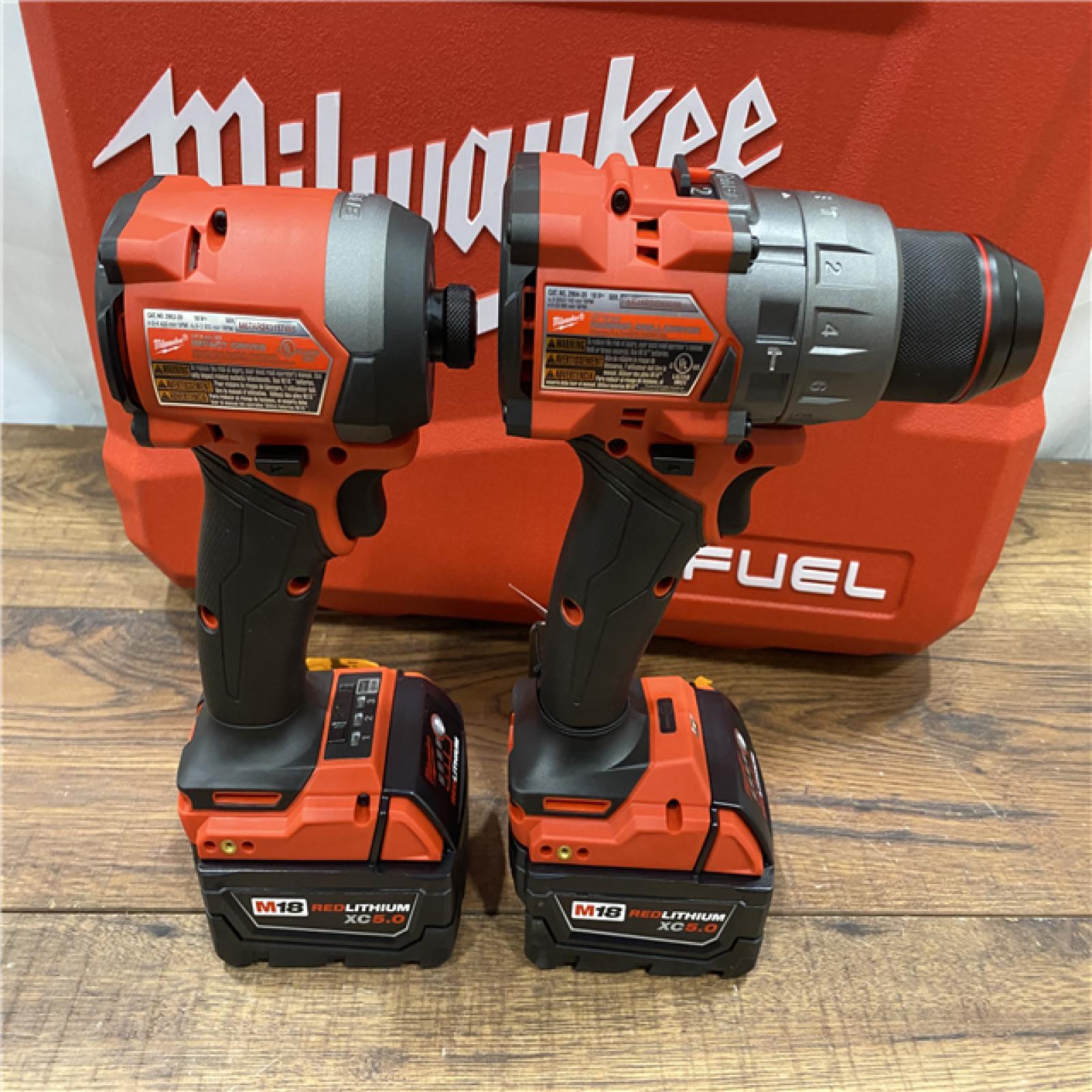 AS IS Milwaukee M18 FUEL 18V Lithium-Ion Brushless Cordless Hammer Drill and Impact Driver Combo Kit (2-Tool) with 2 Batteries