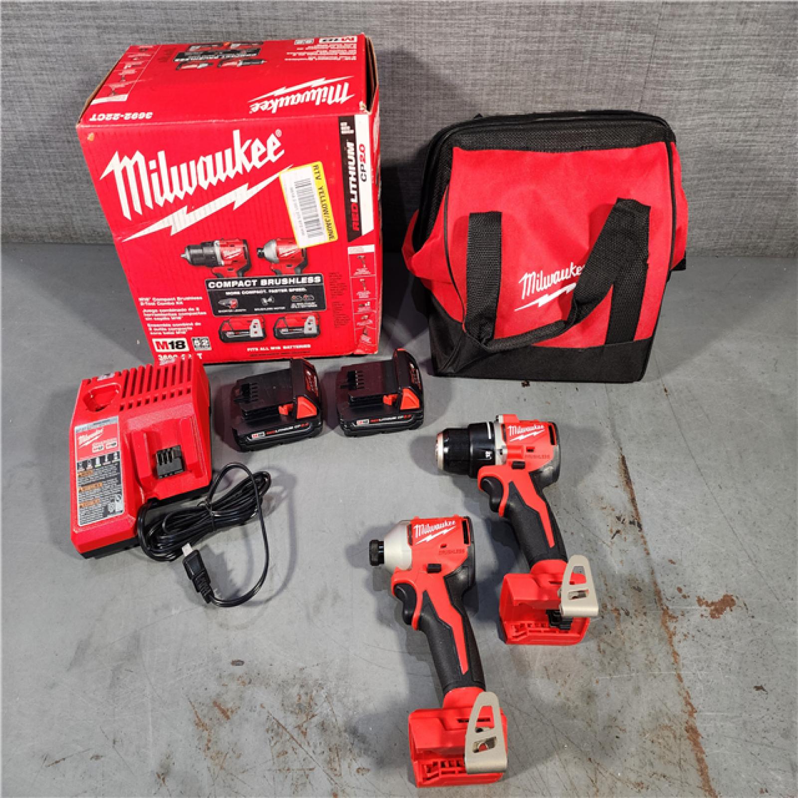 HOUSTON LOCATION - AS-IS (APPEARS LIKE NEW) M18 18V Lithium-Ion Brushless Cordless Compact Drill/Impact Combo Kit (2-Tool) W/(2) 2.0 Ah Batteries, Charger & Bag