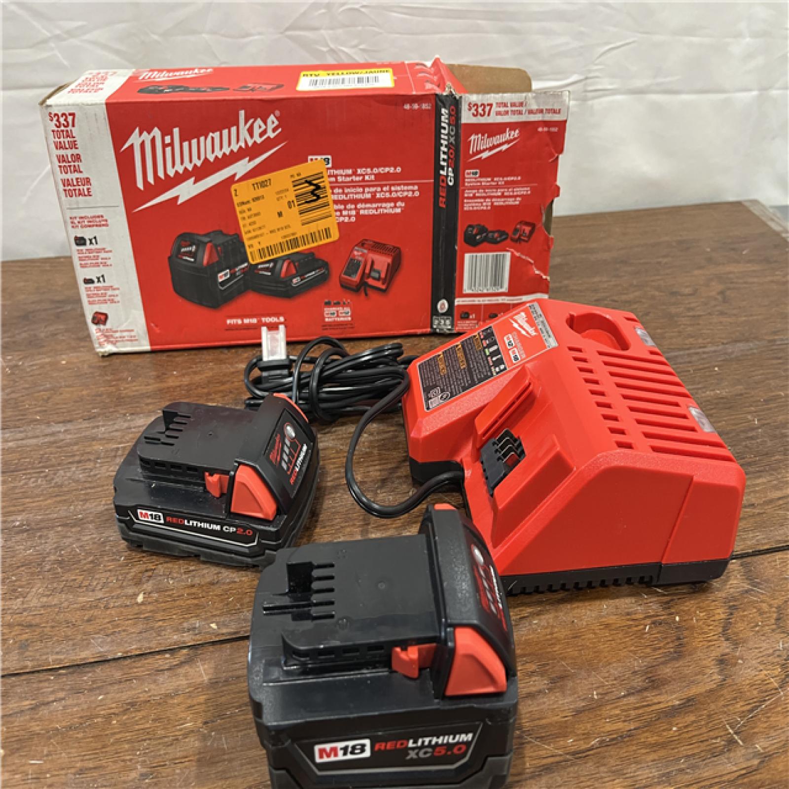 AS-IS Milwaukee M18 Redlithium Xc5.0 Resistant Battery Starter Kit