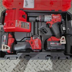 Houston location AS-IS Milwaukee 3697-22 M18 FUEL 1/2 Hammer Driller/Driver &1/4 Hex Impact Driver 2 Tool Combo Kit