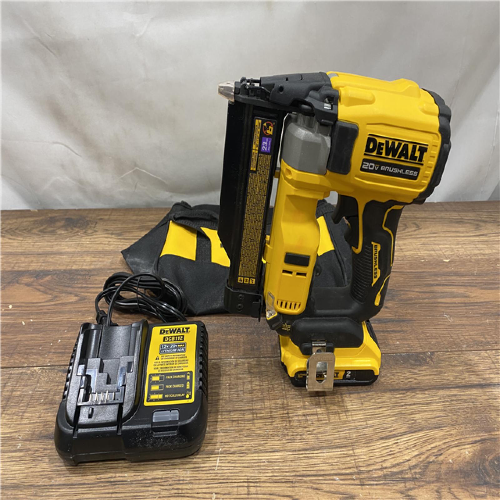 AS IS DeWalt DCN623D1 20-Volt MAX Atomic Compact Cordless Pin Nailer Kit  Brushless Motor  23 Gauge  Battery - Quantity 1