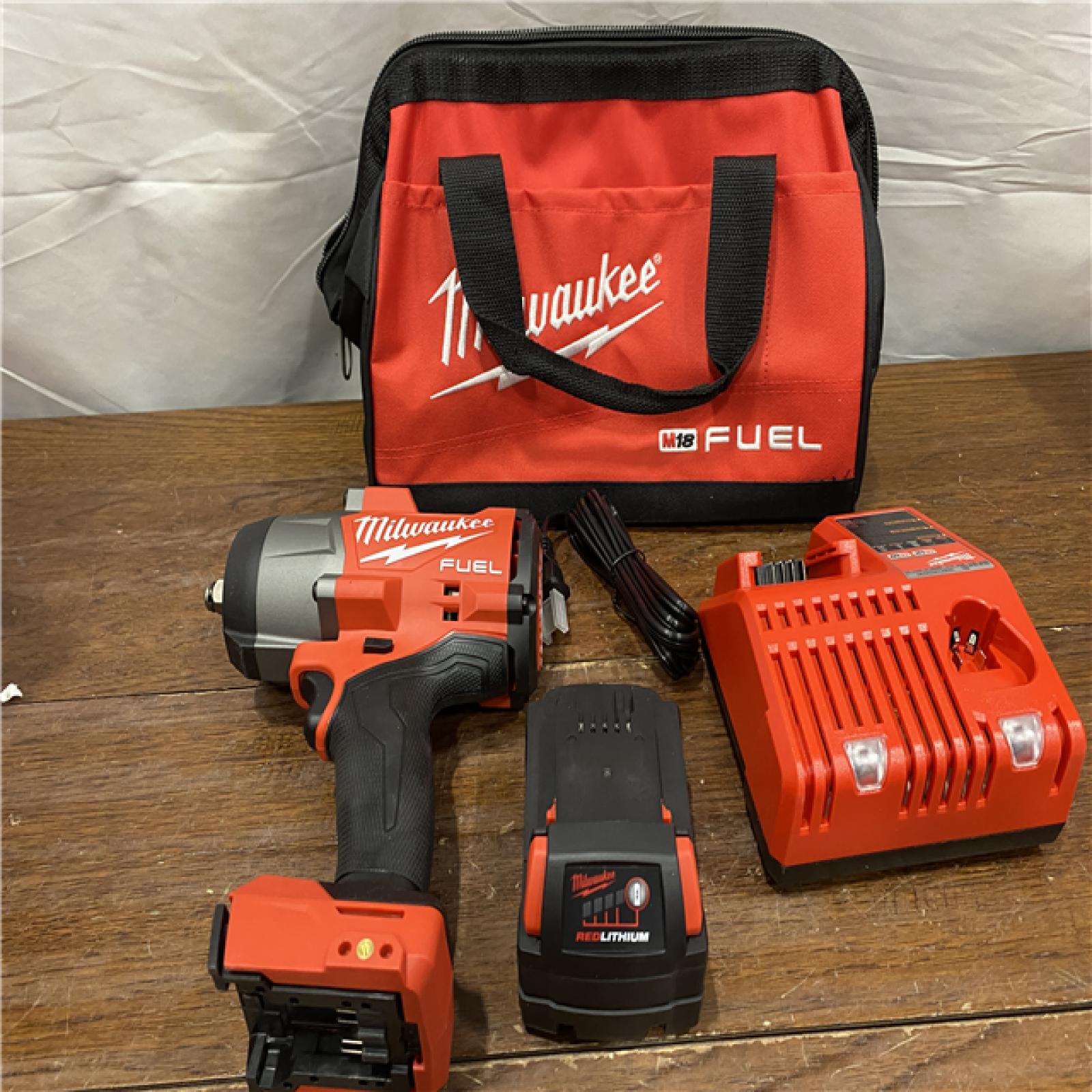 AS-ISMilwaukee M18 1/2 in. Cordless Brushless High Torque Impact Wrench Kit (Battery & Charger)