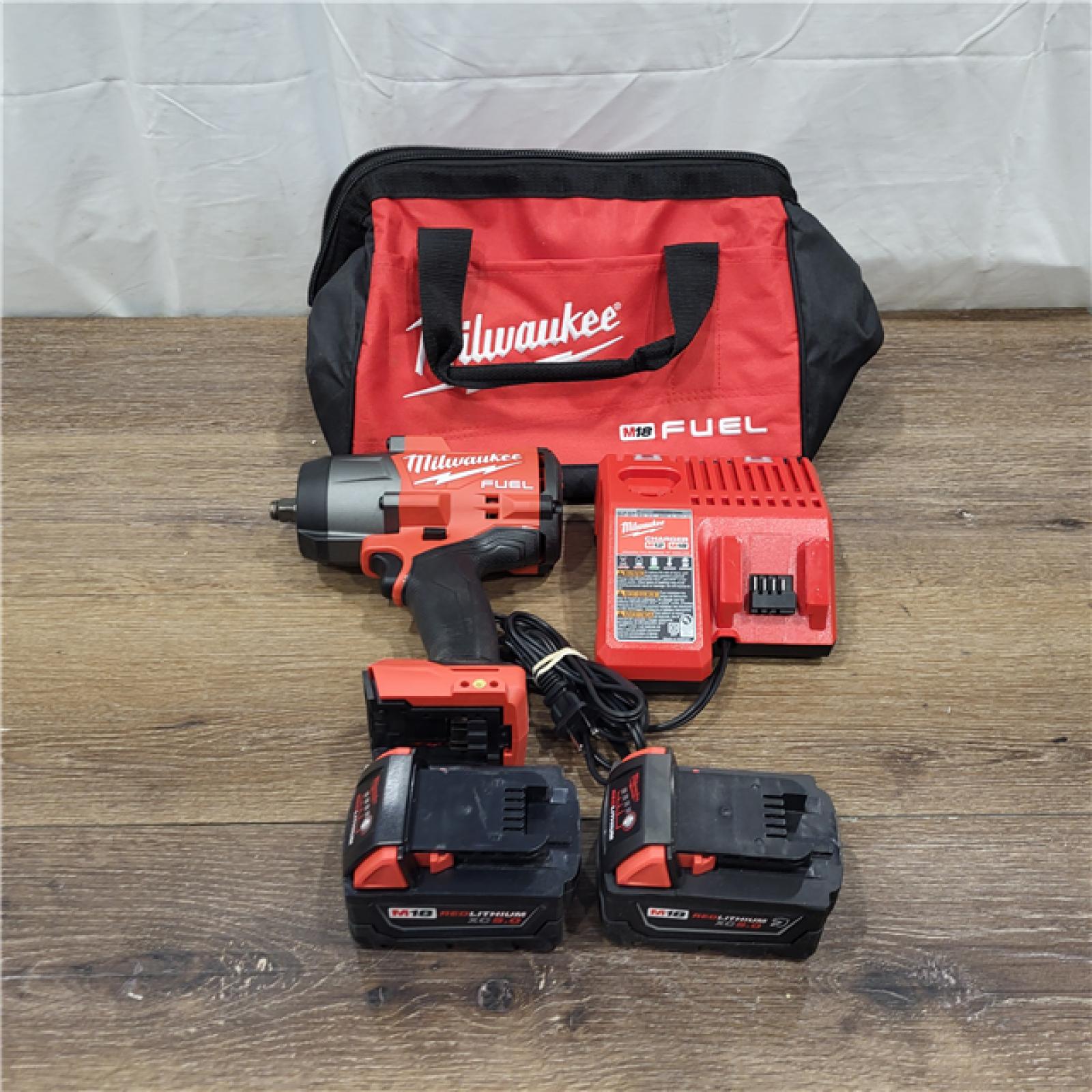 AS-IS Milwaukee M18 FUEL Brushless Cordless High-Torque 1/2 in. Impact Wrench W/Friction Ring Kit