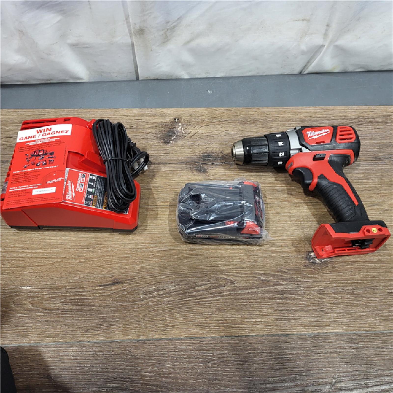 AS-IS Milwaukee M18 1/2 in. Cordless Brushless High Torque Impact Wrench Kit (Battery & Charger)