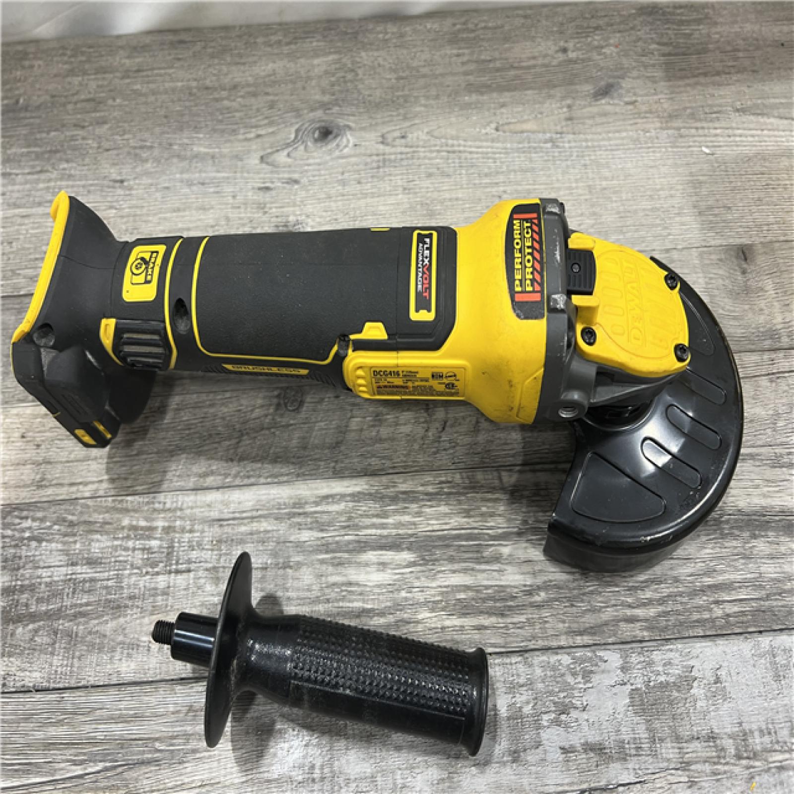 AS-IS DEWALT 20V MAX Cordless Brushless 4.5 - 5 in. Paddle Switch Angle Grinder with FLEXVOLT ADVANTAGE (Tool Only)