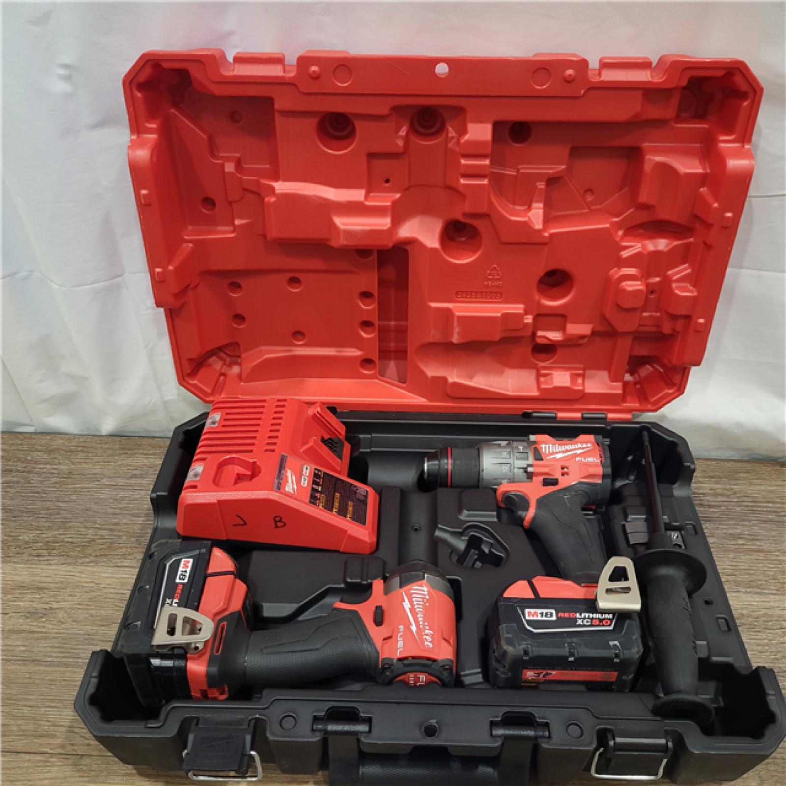 AS-IS Milwaukee M18 FUEL 18V Lithium-Ion Brushless Cordless Hammer Drill and Impact Driver Combo Kit (2-Tool) with 2 Batteries