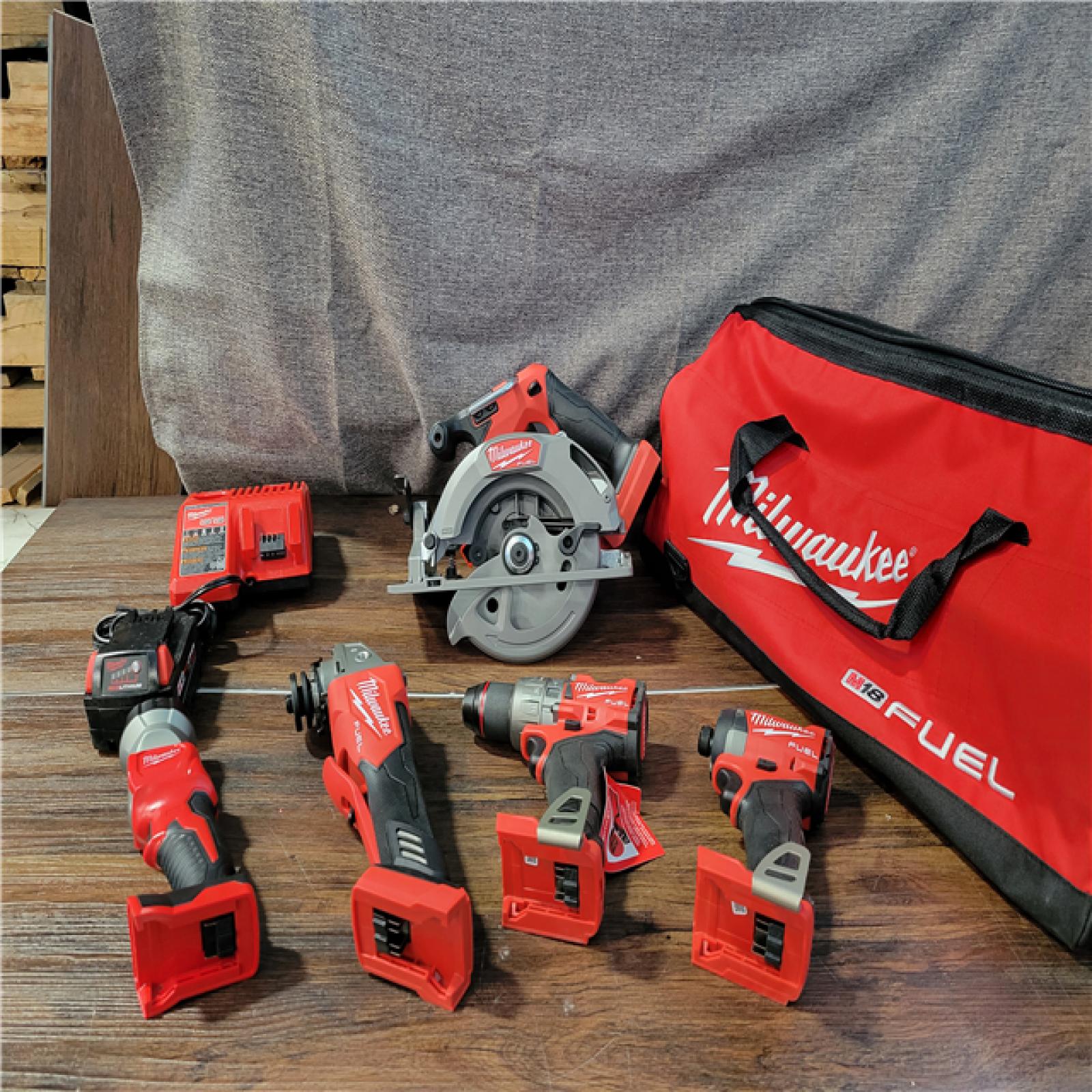 CALIFORNIA AS-IS MILWAUKEE M18 FUEL 5-TOOL COMBO KIT (1 BATTERY, CHARGER, AND BAG INCLUDED) (MISSING 1 BATTERY)