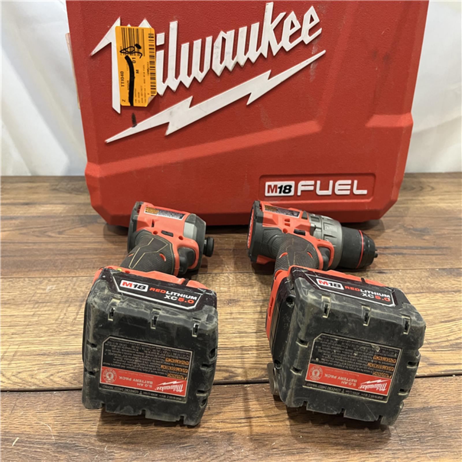 AS IS Milwaukee M18 FUEL 18V Lithium-Ion Brushless Cordless Hammer Drill and Impact Driver Combo Kit (2-Tool) with 2 Batteries