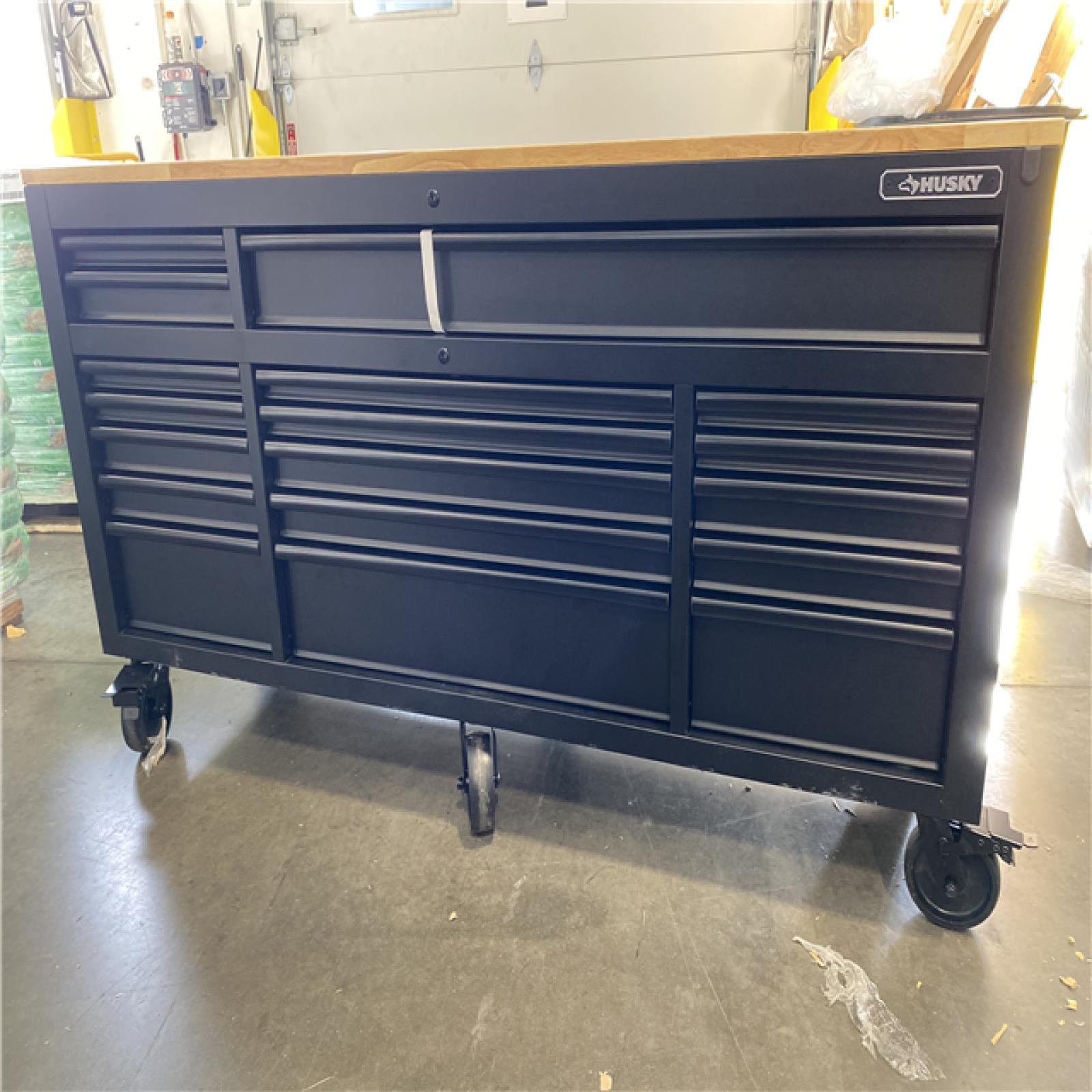 DALLAS LOCATION - Husky 72 in. W x 24 in. D Heavy Duty 18-Drawer Mobile Workbench Cabinet with Adjustable-Height Hardwood Top in Matte Black