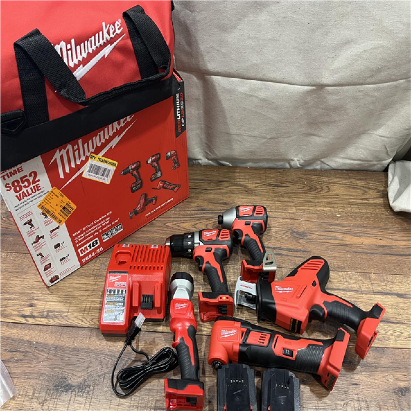 AS-IS Milwaukee M18 18V Lithium-Ion Cordless Combo Kit (5-Tool) with (2) Batteries, Charger and Tool Bag