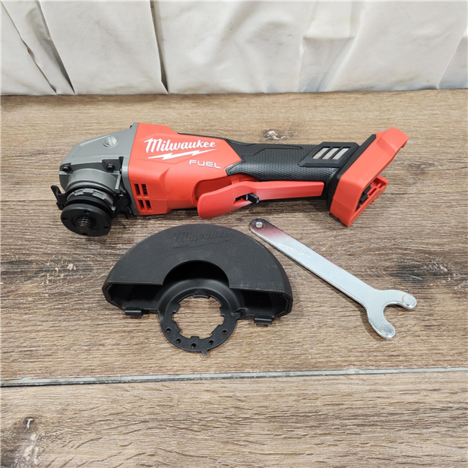 AS-IS Milwaukee 2880-20 M18 FUEL 18-Volt Lithium-Ion Brushless Cordless 4-1/2 in./5 in. Grinder W/Paddle Switch (Tool-Only)