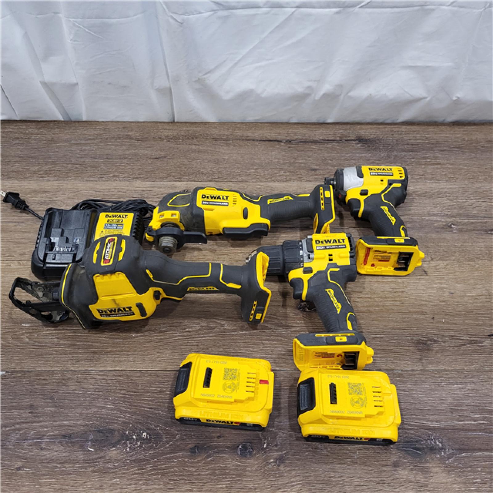 AS-IS DEWALT  ATOMIC 20V MAX Brushless Cordless 4-Tool Combo Kit