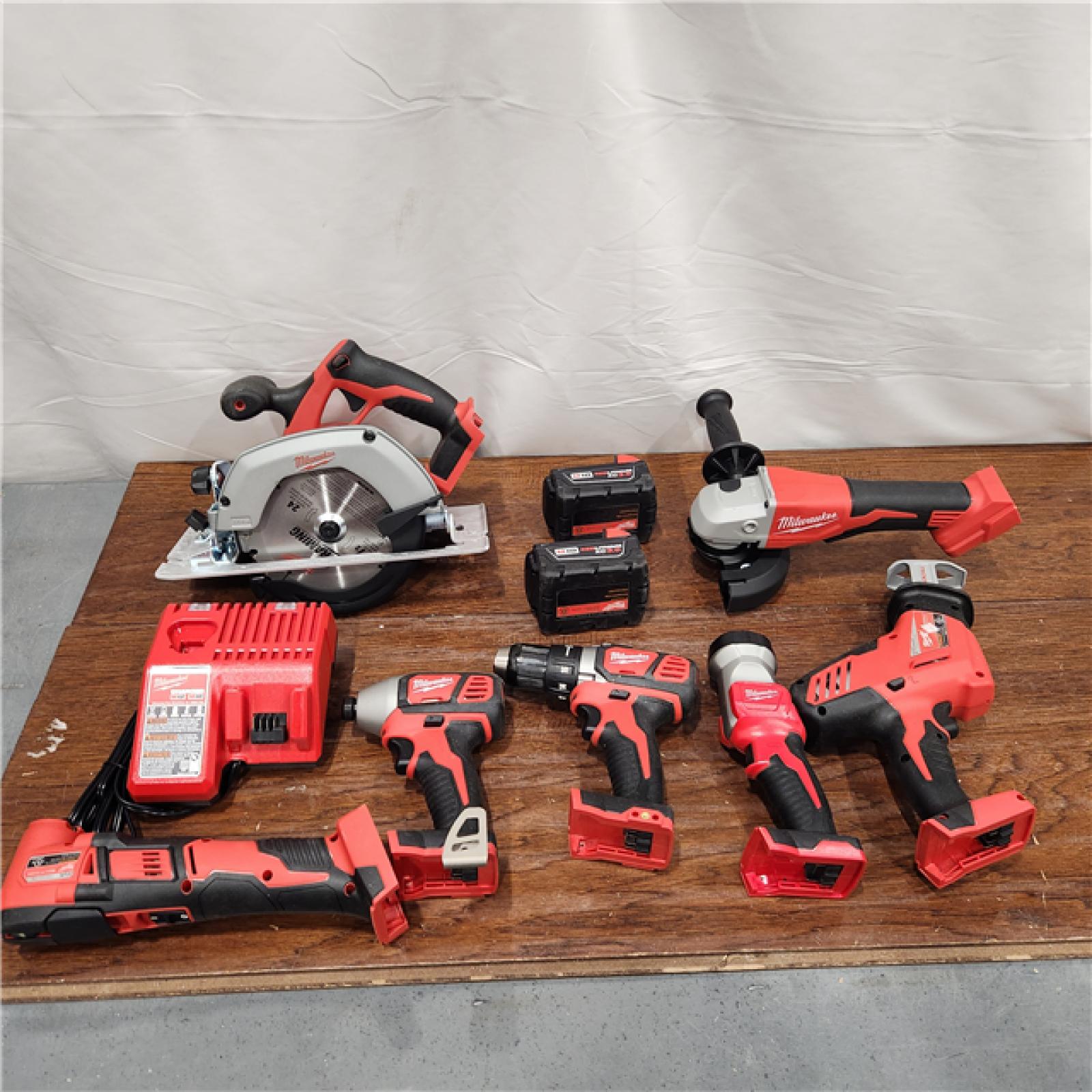 AS-IS Milwaukee M18 18-Volt Lithium-Ion Cordless Combo Kit 7-Tool with 2-Batteries, Charger and Tool Bag