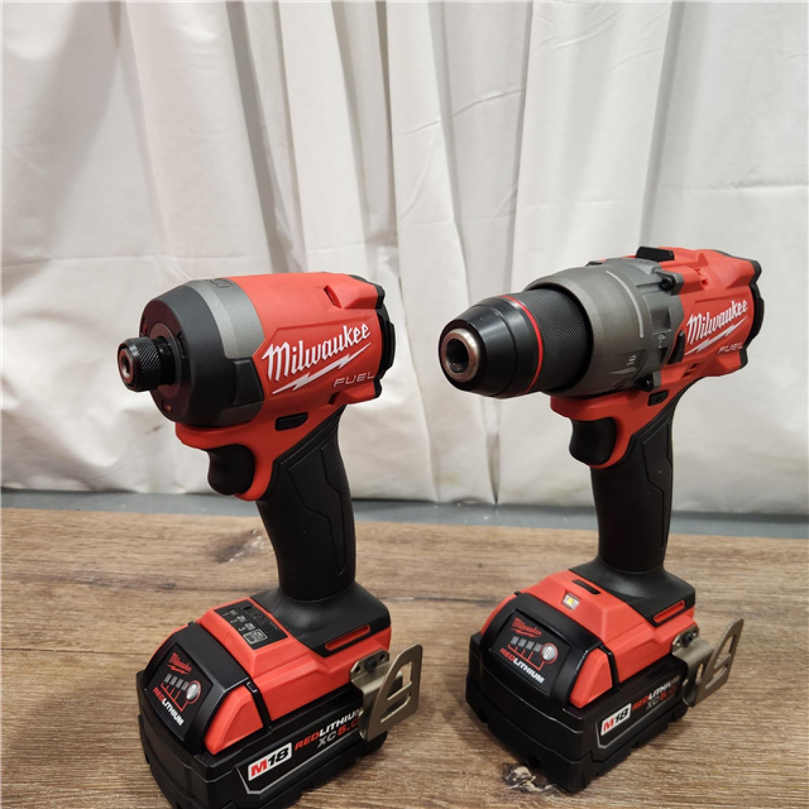 AS-IS Milwaukee M18 FUEL 18V Lithium-Ion Brushless Cordless Hammer Drill and Impact Driver Combo Kit (2-Tool) with 2 Batteries