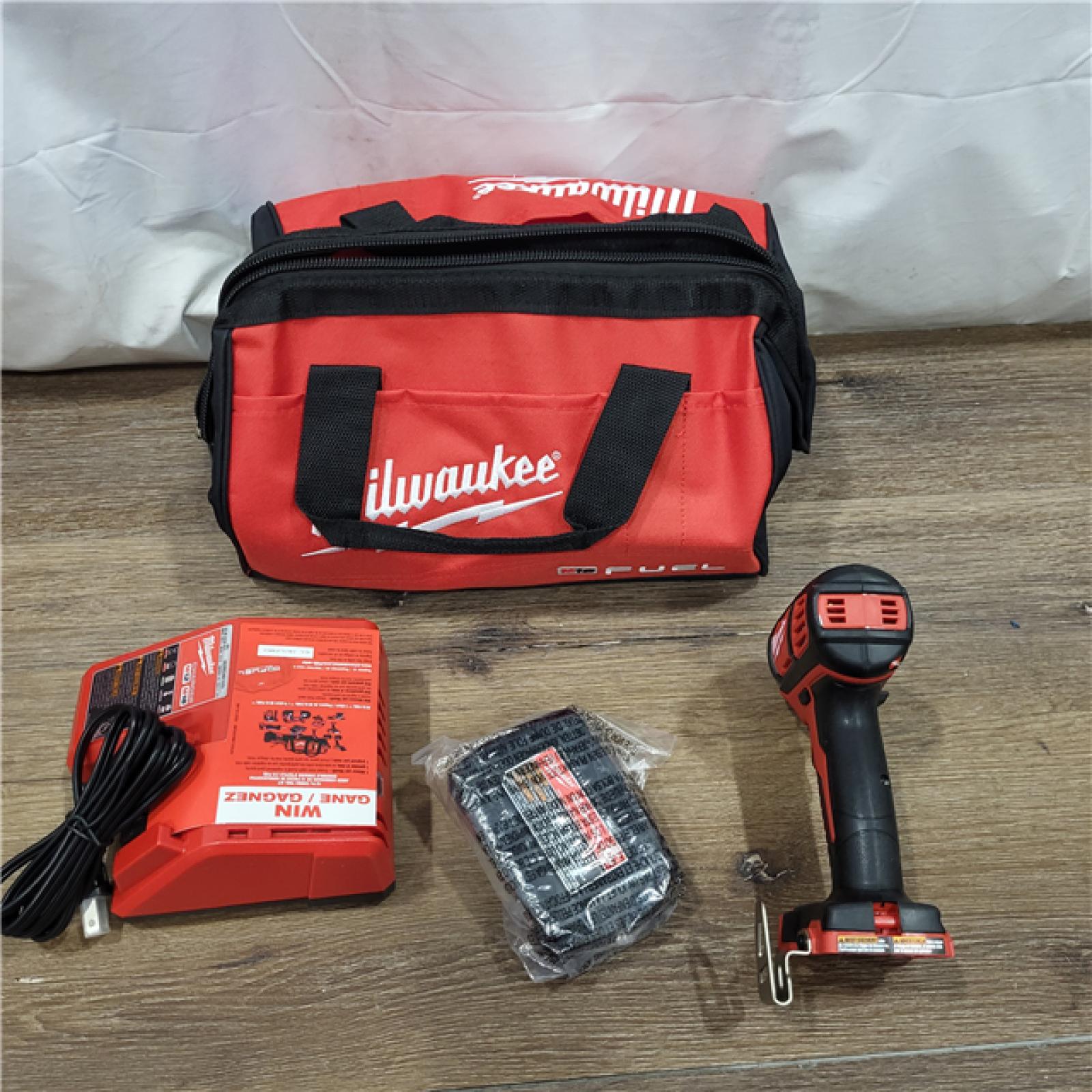 AS-ISMilwaukee M18 1/2 in. Cordless Brushless High Torque Impact Wrench Kit (Battery & Charger)