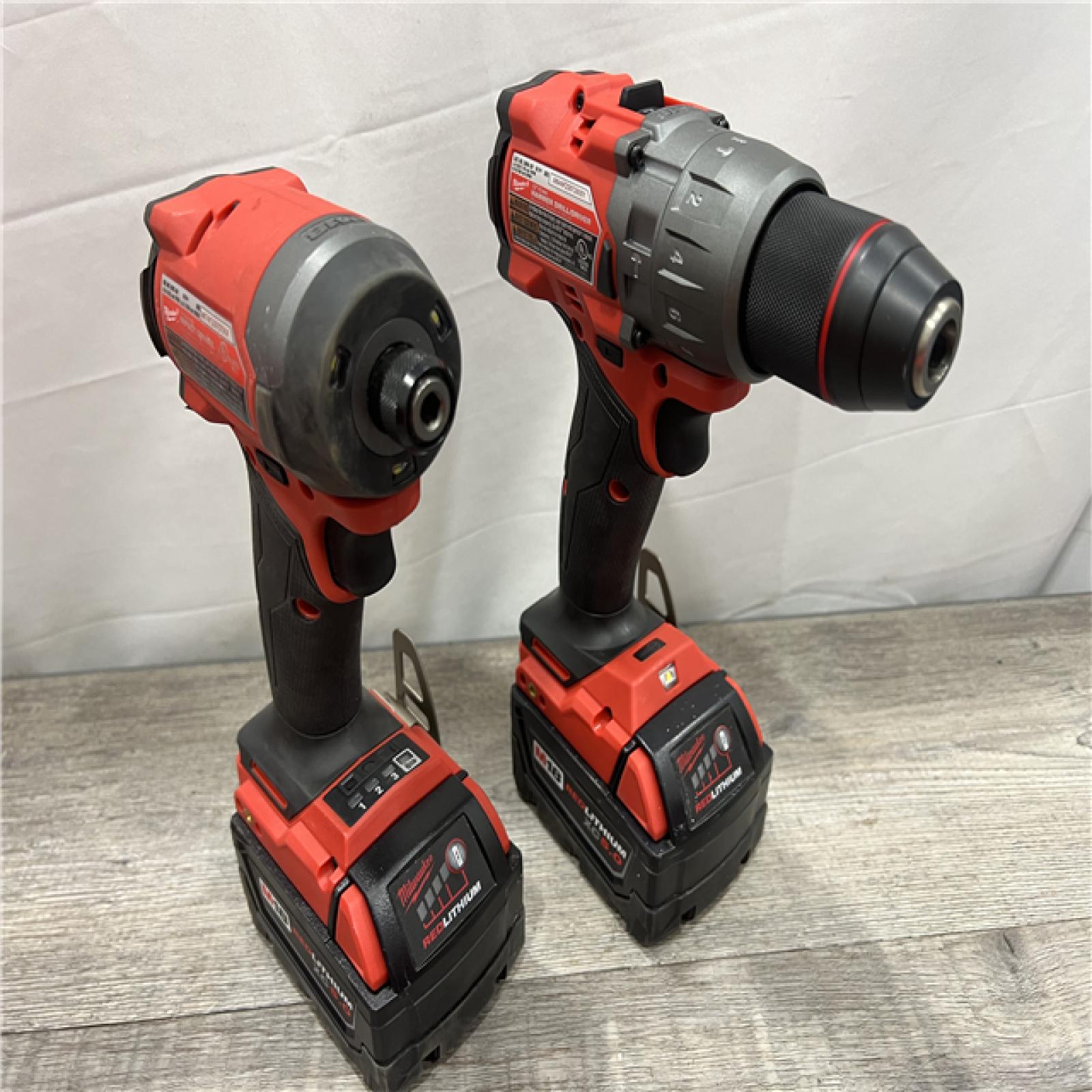 AS-IS MILWAUKEE M18 FUEL 18V Lithium-Ion Brushless Cordless Hammer Drill and Impact Driver Combo Kit (2-Tool) with 2 Batteries