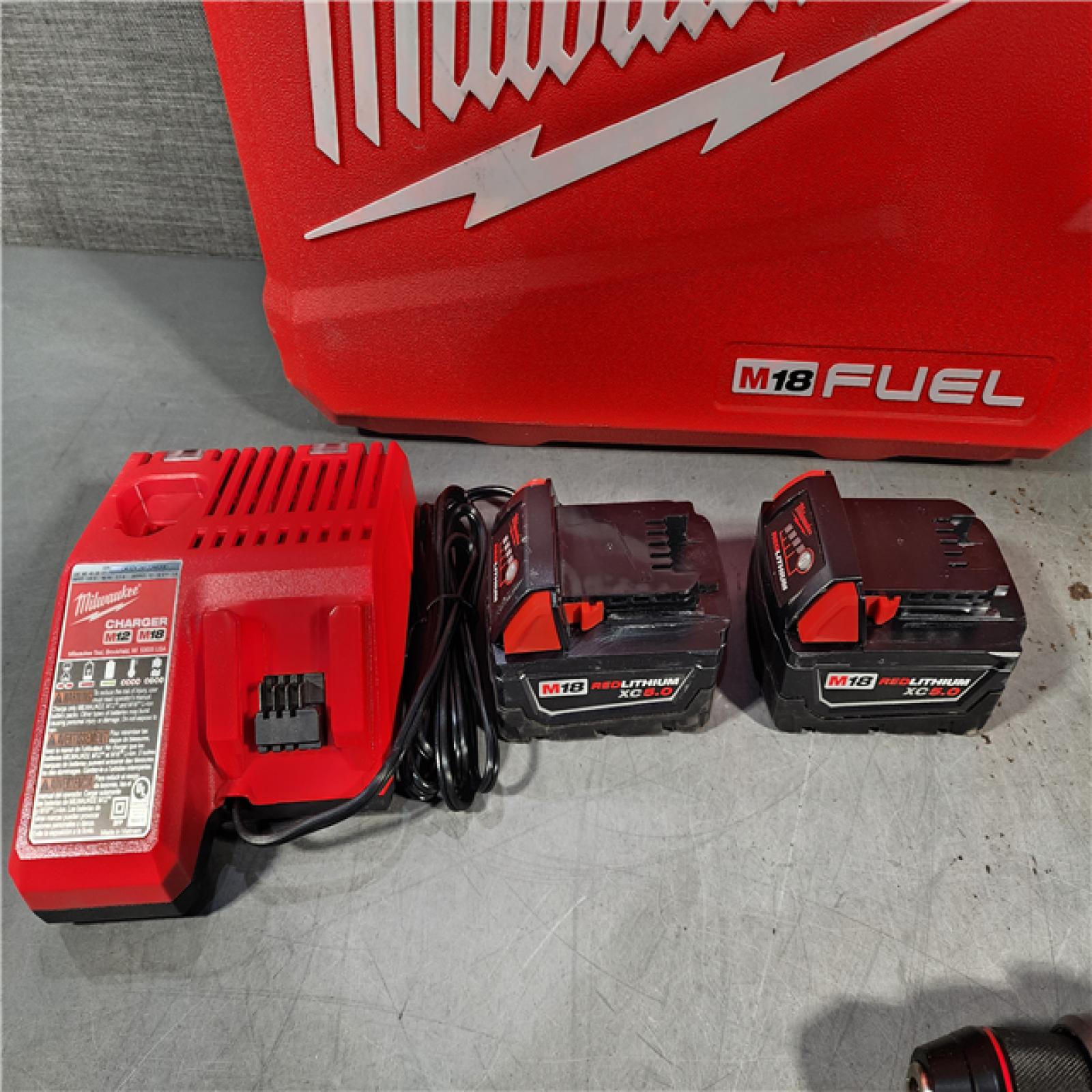 HOUSTON LOCATION - AS-IS Milwaukee M18 FUEL 18V Lithium-Ion Brushless Cordless Hammer Drill and Impact Driver Combo Kit (2-Tool) with 2 Batteries