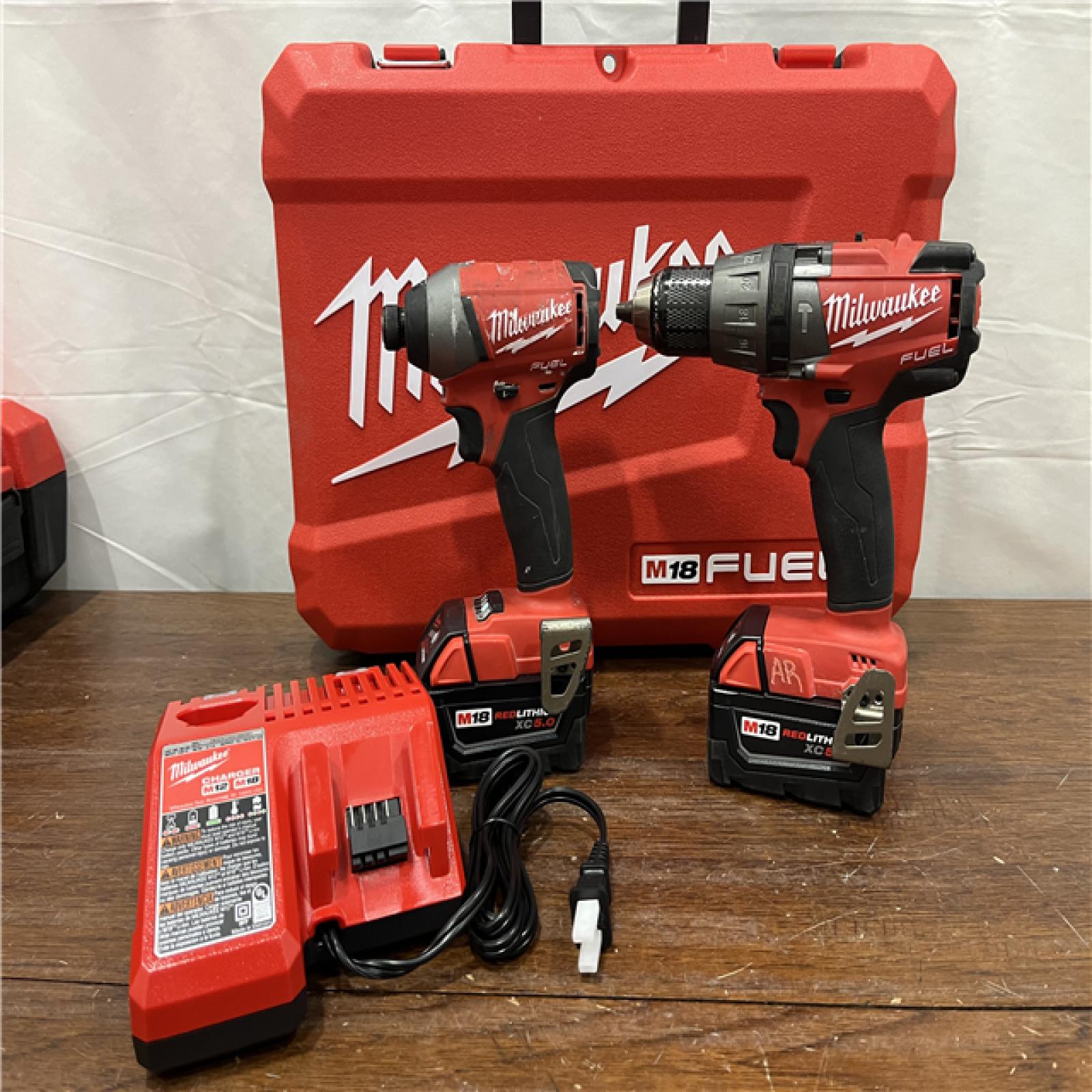 AS-IS Milwaukee M18 FUEL 18V Lithium-Ion Brushless Cordless Hammer Drill and Impact Driver Combo Kit (2-Tool) with 2 Batteries