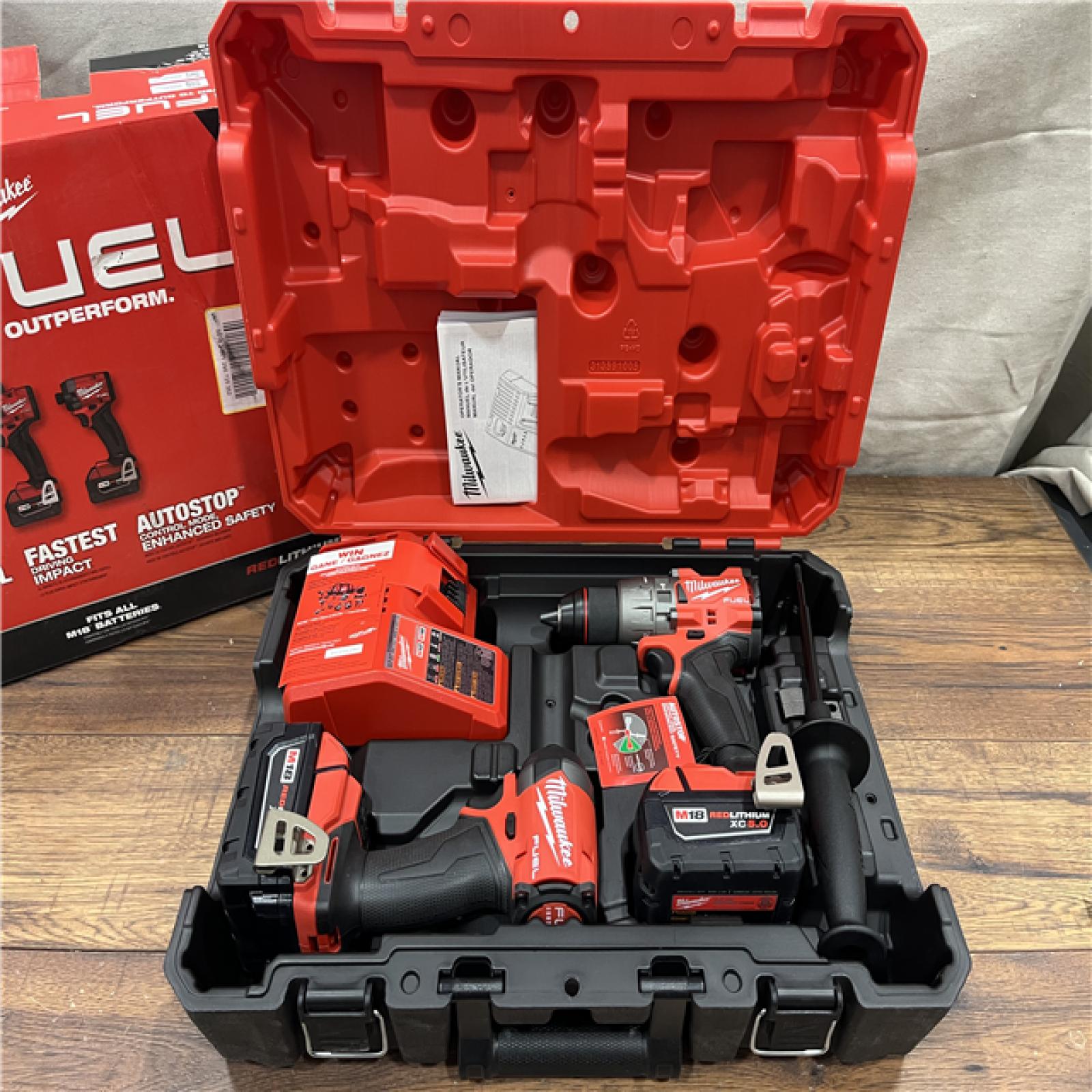 AS-IS Milwaukee M18 FUEL 18V Lithium-Ion Brushless Cordless Hammer Drill and Impact Driver Combo Kit (2-Tool) with 2 Batteries