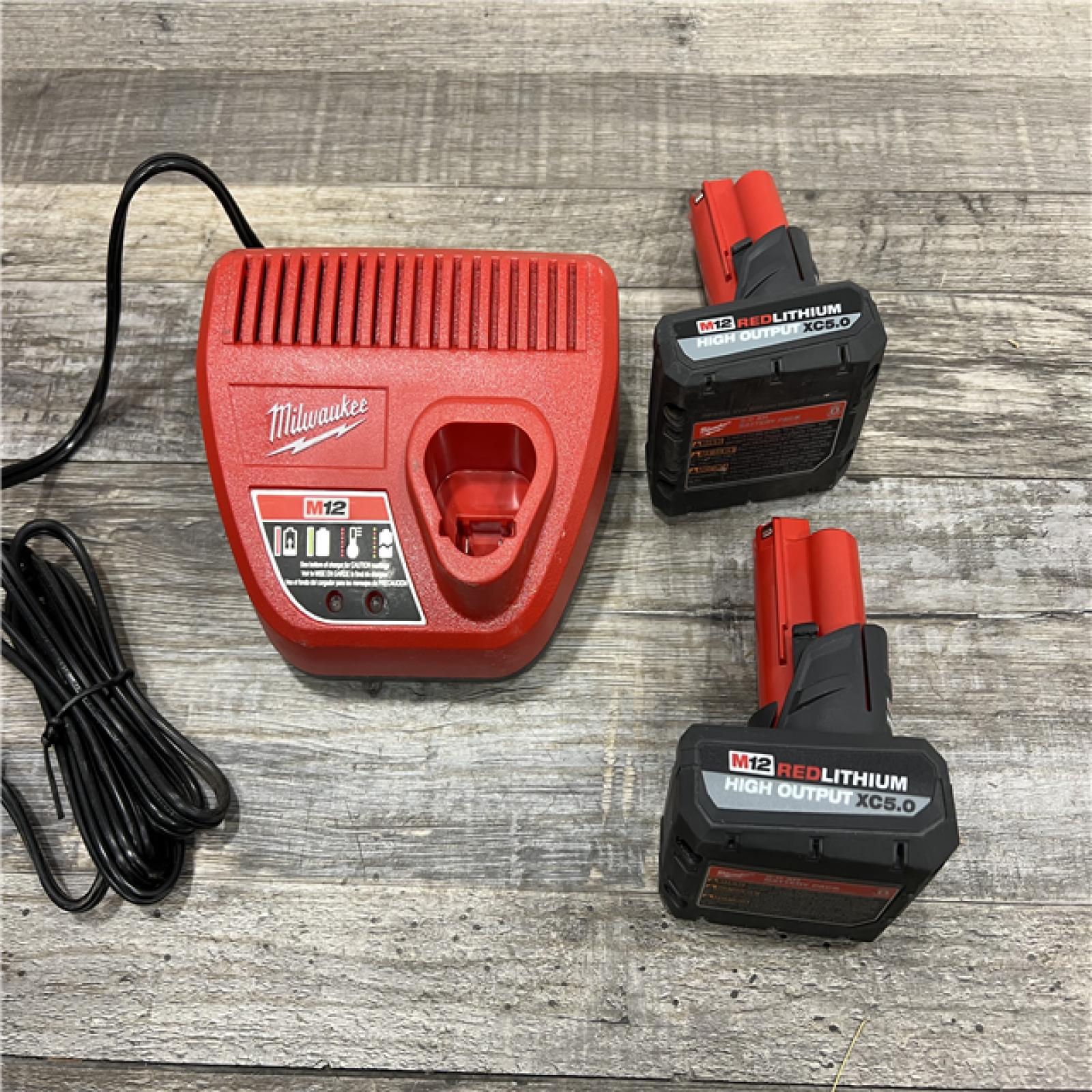 AS-IS Milwaukee M12 12V Lithium-Ion XC High Output 5.0 Ah Battery Pack (2-Pack) Starter Kit with Charger