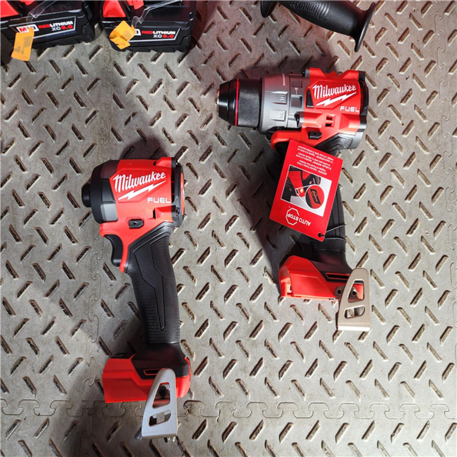 HOUSTON LOCATION - AS-IS (APPEARS LIKE NEW) Milwaukee M18 FUEL 18V Lithium-Ion Brushless Cordless Hammer Drill and Impact Driver Combo Kit (2-Tool) with 2 Batteries