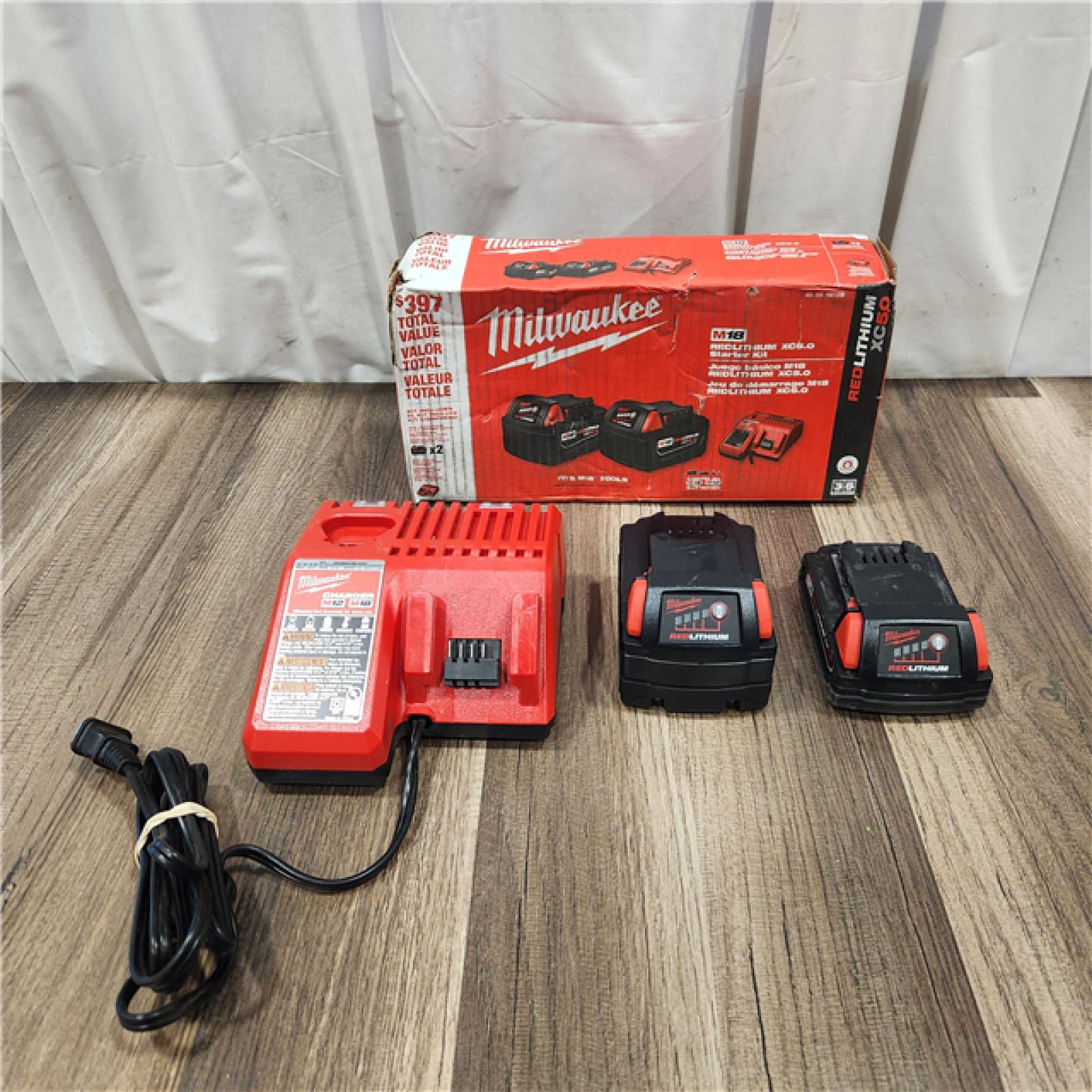 AS IS M18 18-Volt Lithium-Ion XC Starter Kit with Two 5.0Ah Batteries and Charger