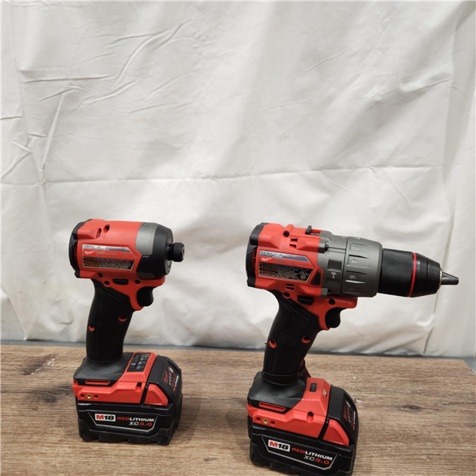 AS-IS Milwaukee M18 FUEL 18V Lithium-Ion Brushless Cordless Hammer Drill and Impact Driver Combo Kit (2-Tool) with 2 Batteries