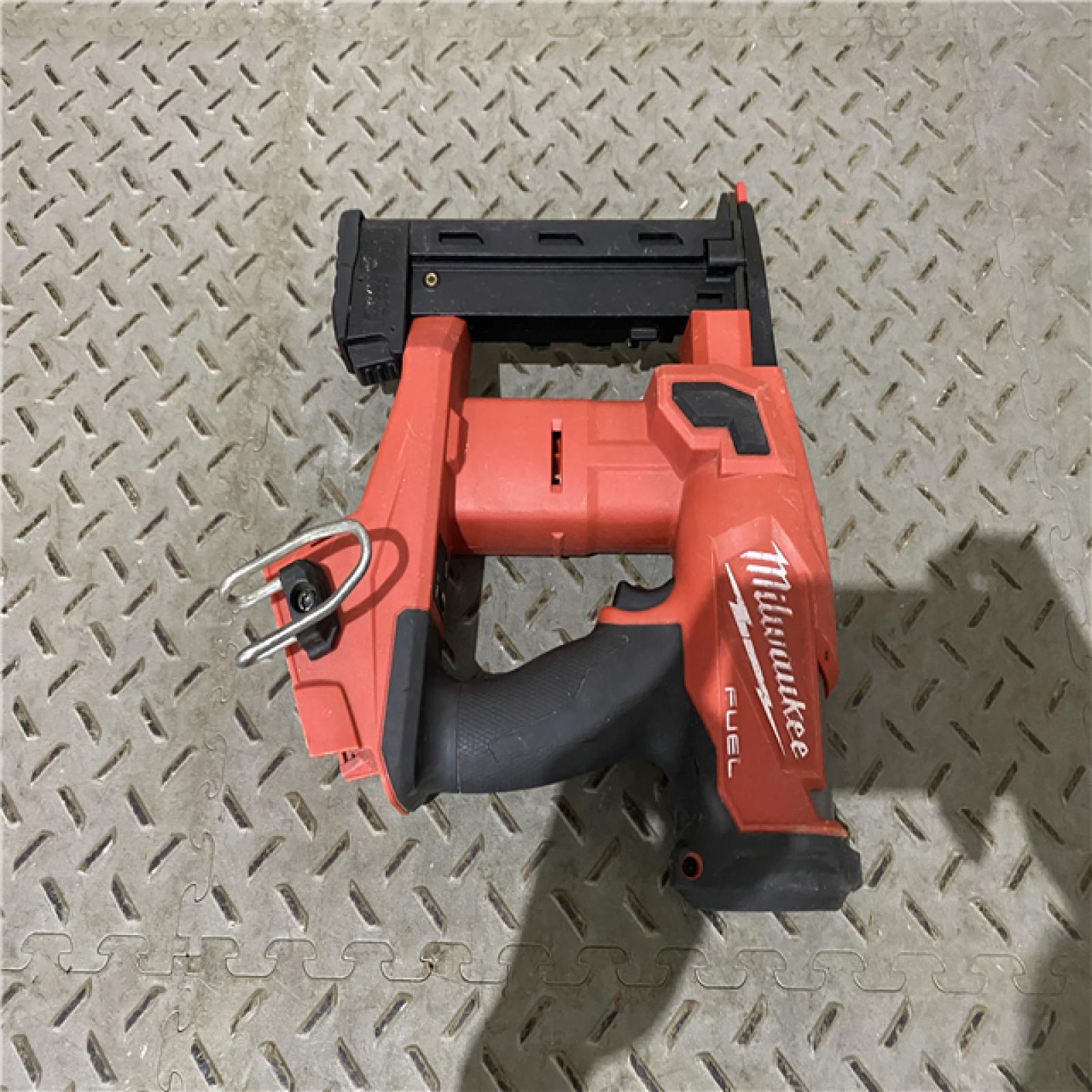 Houston location AS-IS MILWAUKEE M18 FUEL 18-Volt Lithium-Ion Brushless Cordless 18-Gauge 1/4 in. Narrow Crown Stapler (Tool-Only)