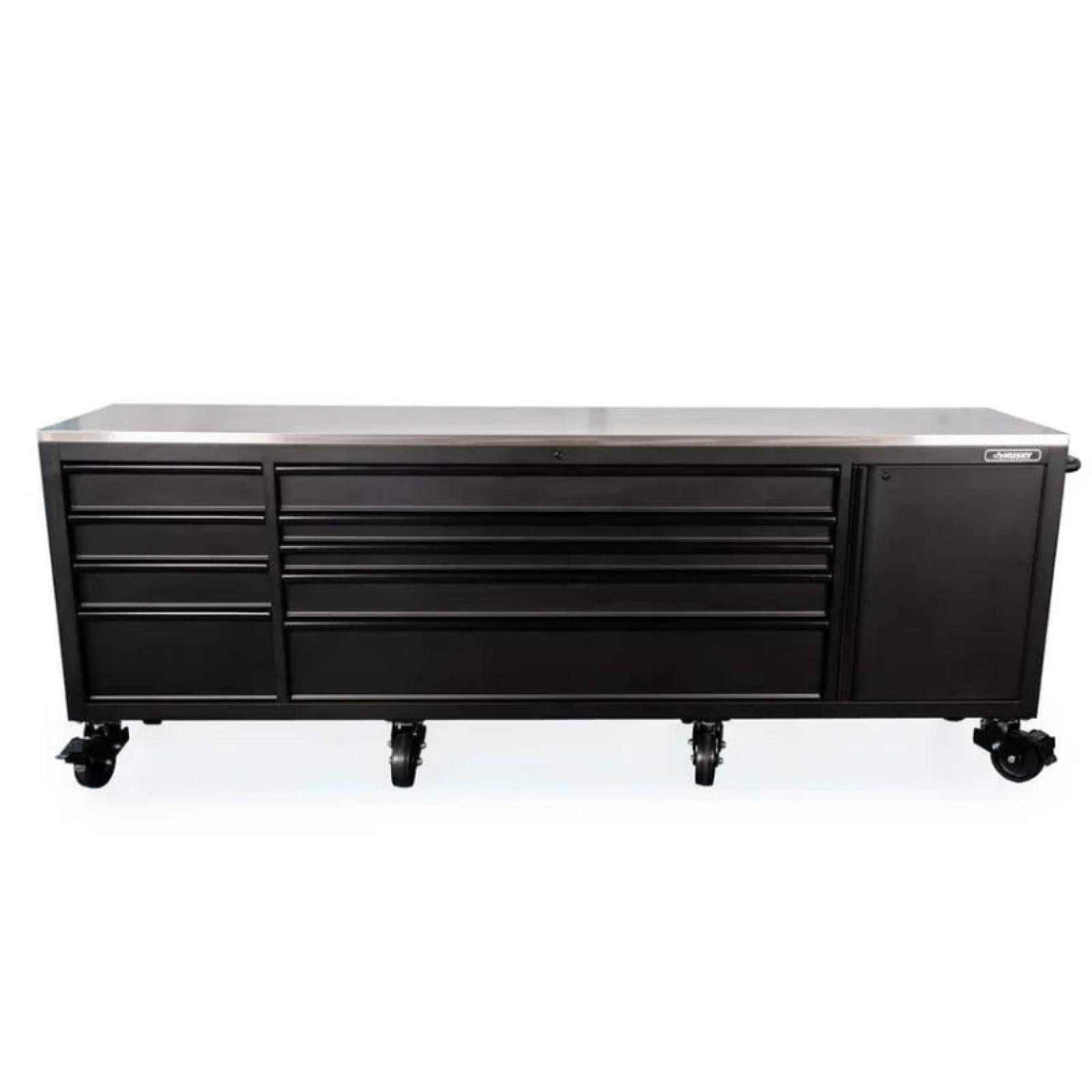 DALLAS LOCATION - HUSKY 108 in. W X 24 in. D 9-Drawer Heavy-Duty Mobile Workbench with Stainless Steel Top in Matte Black