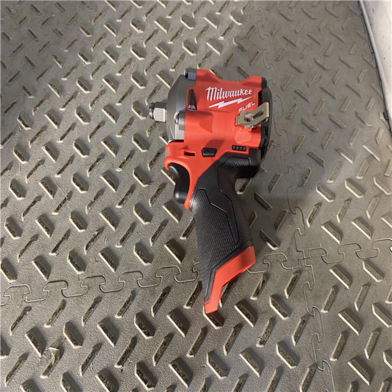 Houston location AS-IS MILWAUKEE M12 FUEL 12V Lithium-Ion Brushless Cordless Stubby 1/2 in. Impact Wrench (Tool-Only)