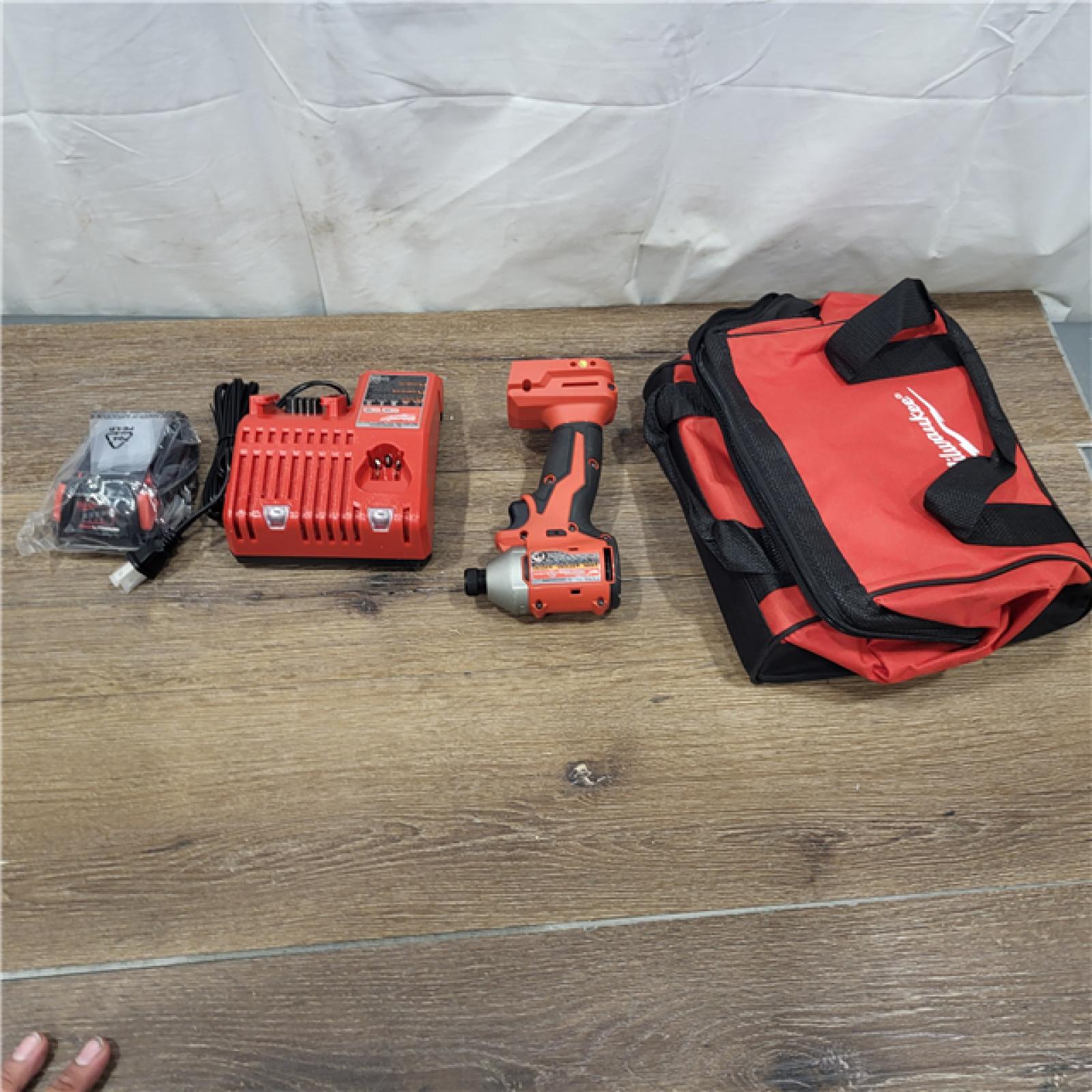 AS-IS Milwaukee M18 Compact Brushless 1/4  Hex Impact Driver Kit