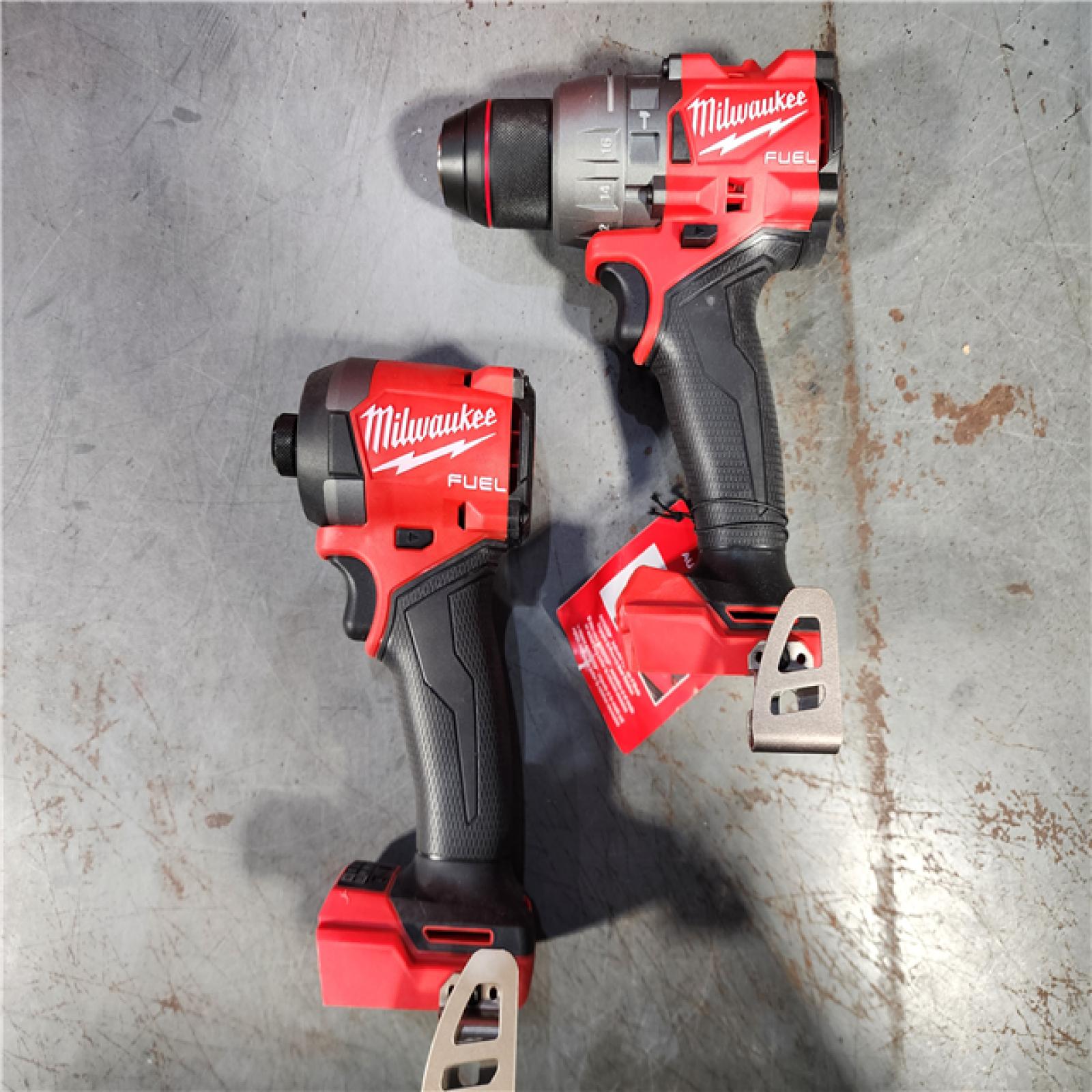 HOUSTON LOCATION - AS-IS (APPEARS LIKE NEW) Milwaukee M18 FUEL 18V Lithium-Ion Brushless Cordless Hammer Drill and Impact Driver Combo Kit (2-Tool) with 2 Batteries