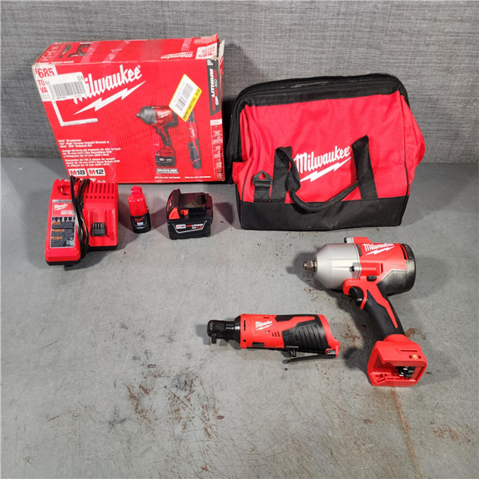 HOUSTON LOCATION - AS-IS (APPEARS LIKE NEW) M12/M18 12/18V Lithium-Ion Cordless 3/8 in. Ratchet and 1/2 in. High Torque Impact Wrench with Friction Ring Combo Kit