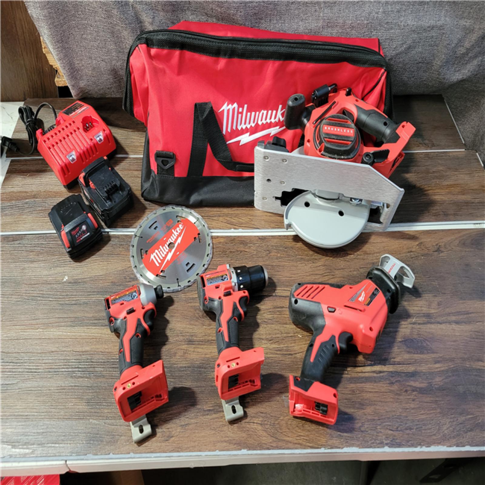 CALIFORNIA NEW MILWAUKEE M18 4-TOOL COMBO KIT (2 BATTERIES, 1 CHARGER, AND BAG INCLUDED)