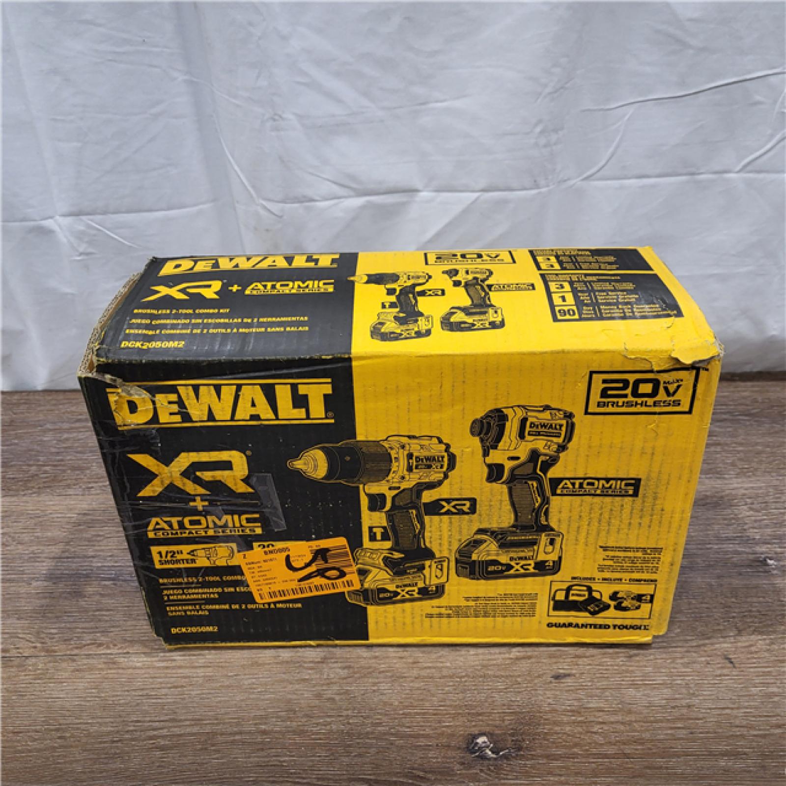 AS-IS DEWALT 20V MAX XR Hammer Drill and ATOMIC Impact Driver 2 Tool Cordless Combo Kit with (2) 4.0Ah Batteries, Charger, and Bag