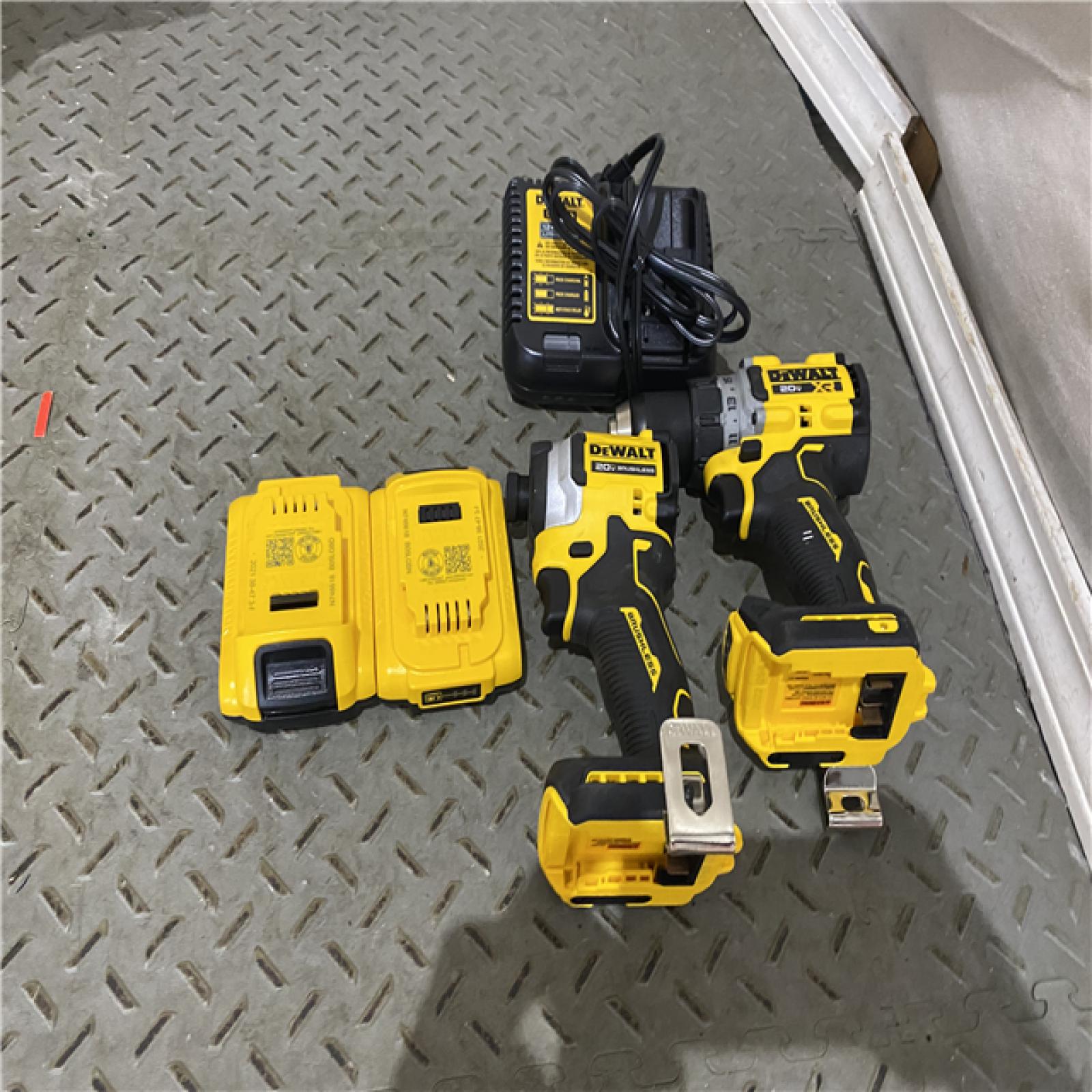 Houston location AS-IS DEWALT 20V MAX XR Cordless Drill/Driver, ATOMIC Impact Driver 2 Tool Combo Kit, (2) 2.0Ah Batteries, Charger, and Bag