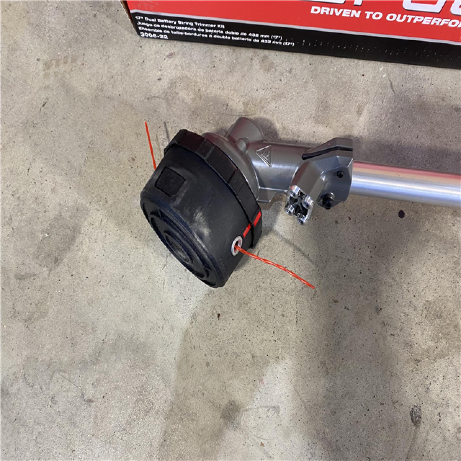 HOUSTON LOCATION - AS-IS M18 FUEL 18V Brushless Cordless 17 in. Dual Battery Straight Shaft String Trimmer with (2) 8.0 Ah Batteries and Charger