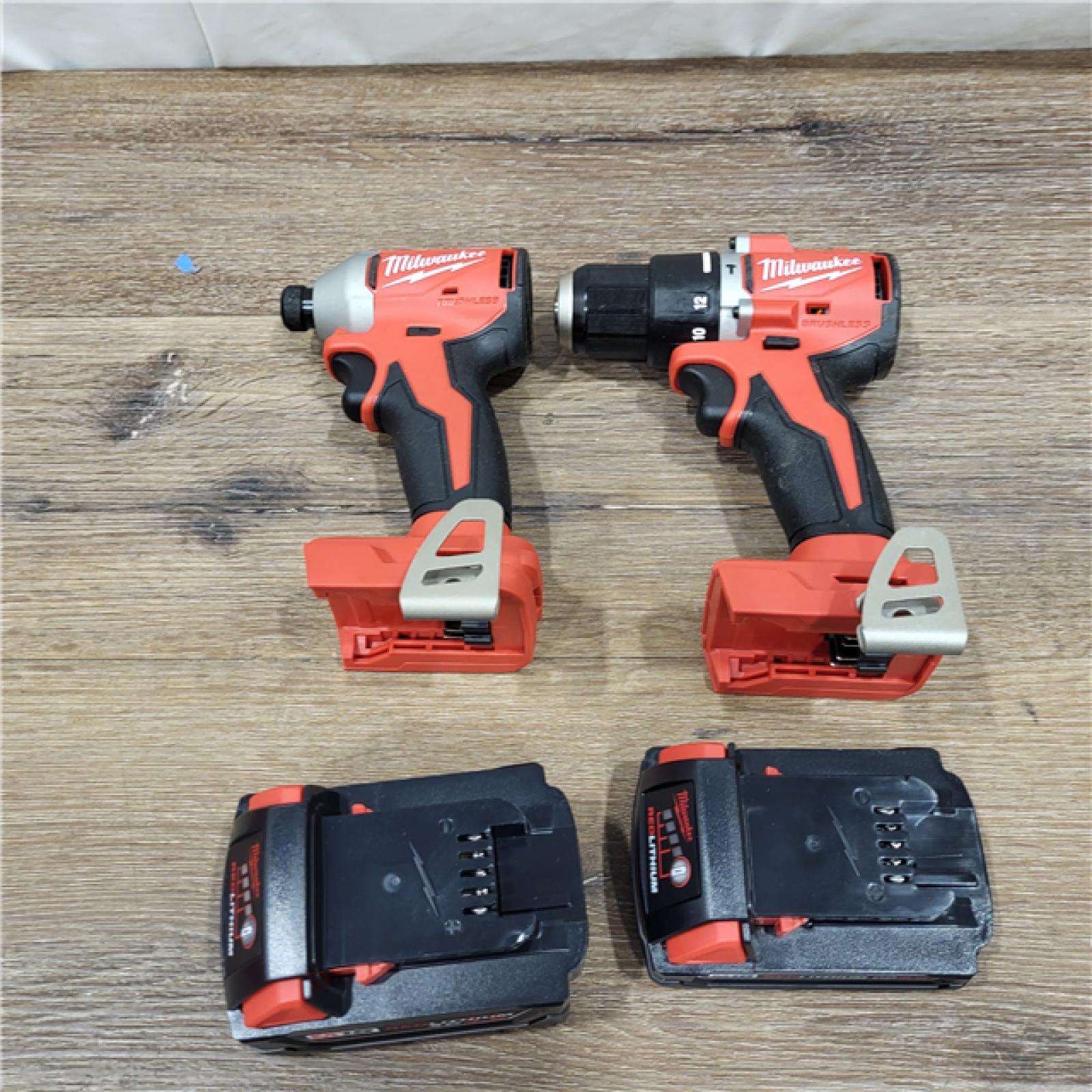 AS-IS M18 18-Volt Lithium-Ion Brushless Cordless Compact Hammer Drill/Impact Combo Kit (2-Tool) with (2) Batteries, Bag