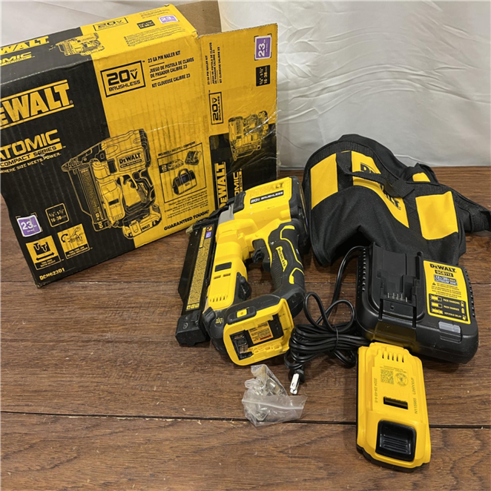 AS-ISDeWalt DCN623D1 20-Volt MAX Atomic Compact Cordless Pin Nailer Kit  Brushless Motor  23 Gauge  Battery - Quantity 1