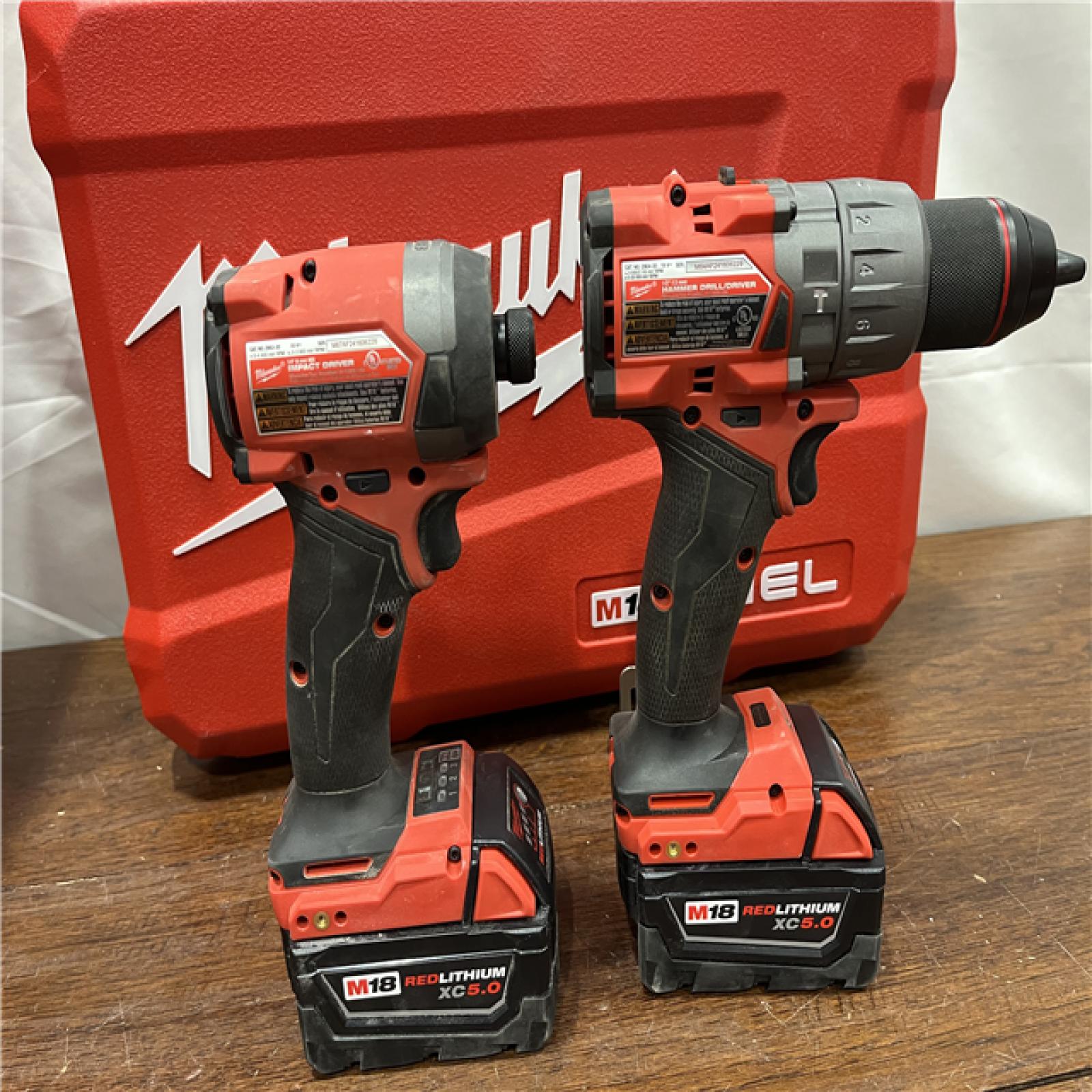 AS-ISMilwaukee M18 FUEL 18V Lithium-Ion Brushless Cordless Hammer Drill and Impact Driver Combo Kit (2-Tool) with 2 Batteries