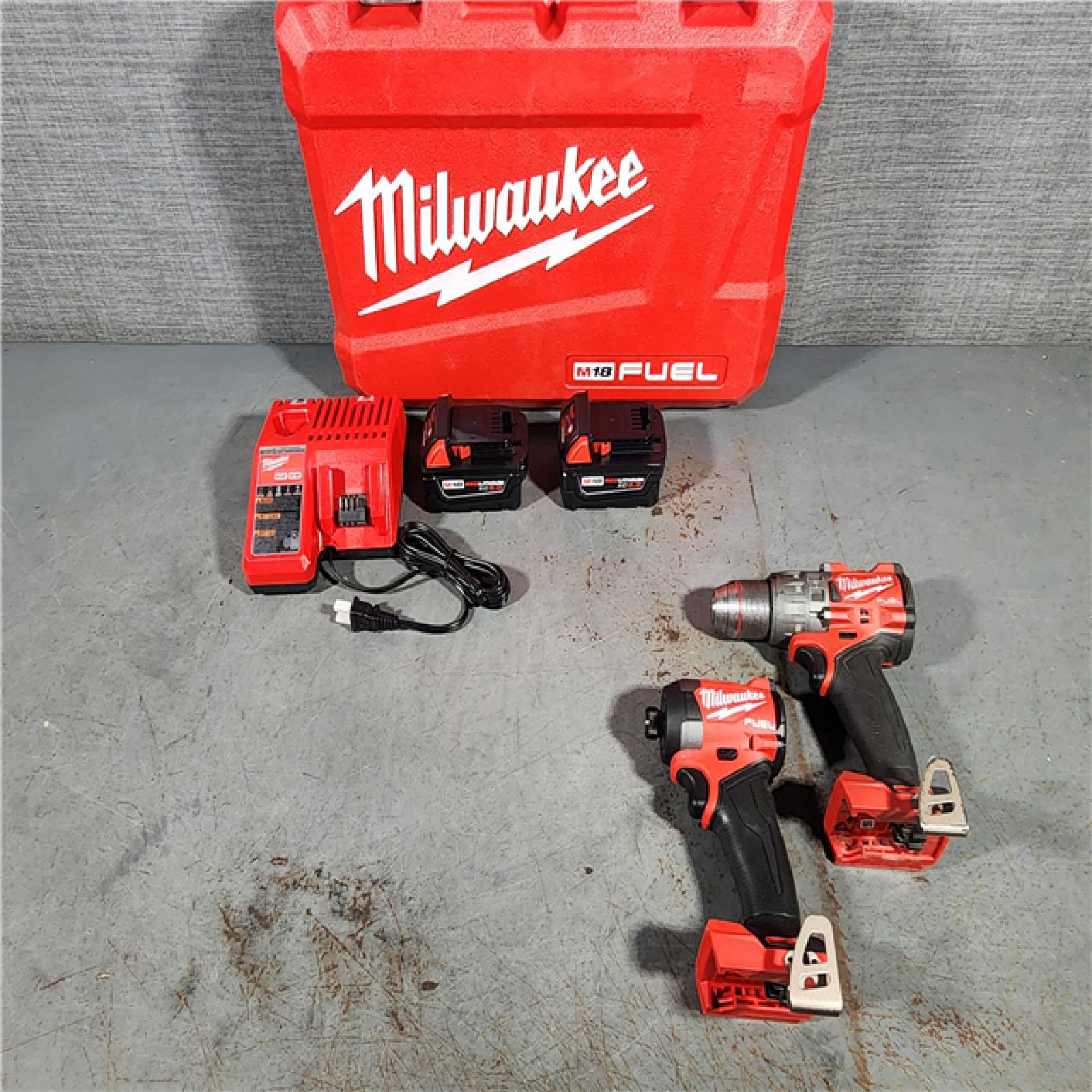 HOUSTON LOCATION - AS-IS Milwaukee M18 FUEL 18V Lithium-Ion Brushless Cordless Hammer Drill and Impact Driver Combo Kit (2-Tool) with 2 Batteries