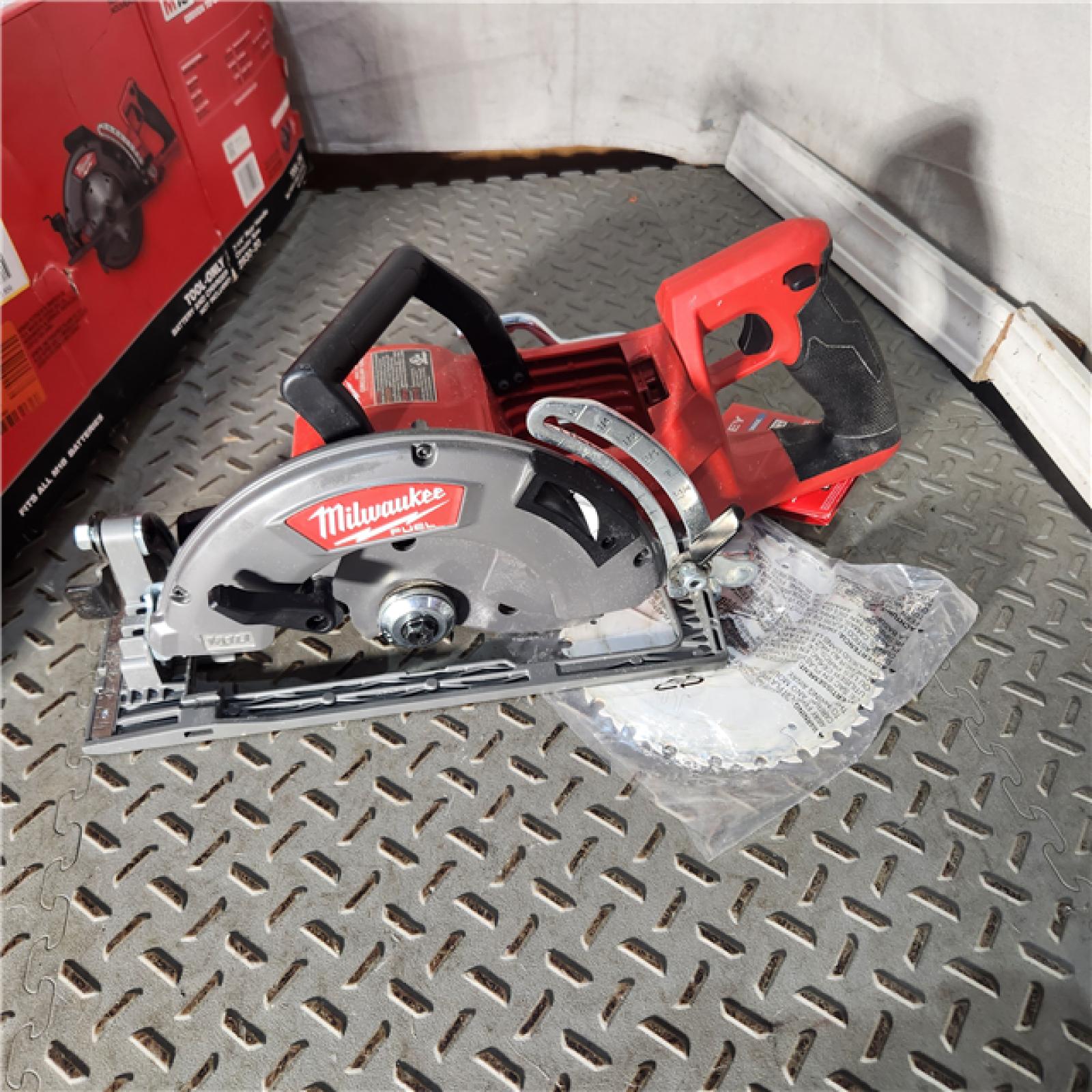 Houston location AS-IS Milwaukee 2830-20 Rear Handle Circular Saw M18 FUEL 7-1/4  Cordless Brushless Tool Only